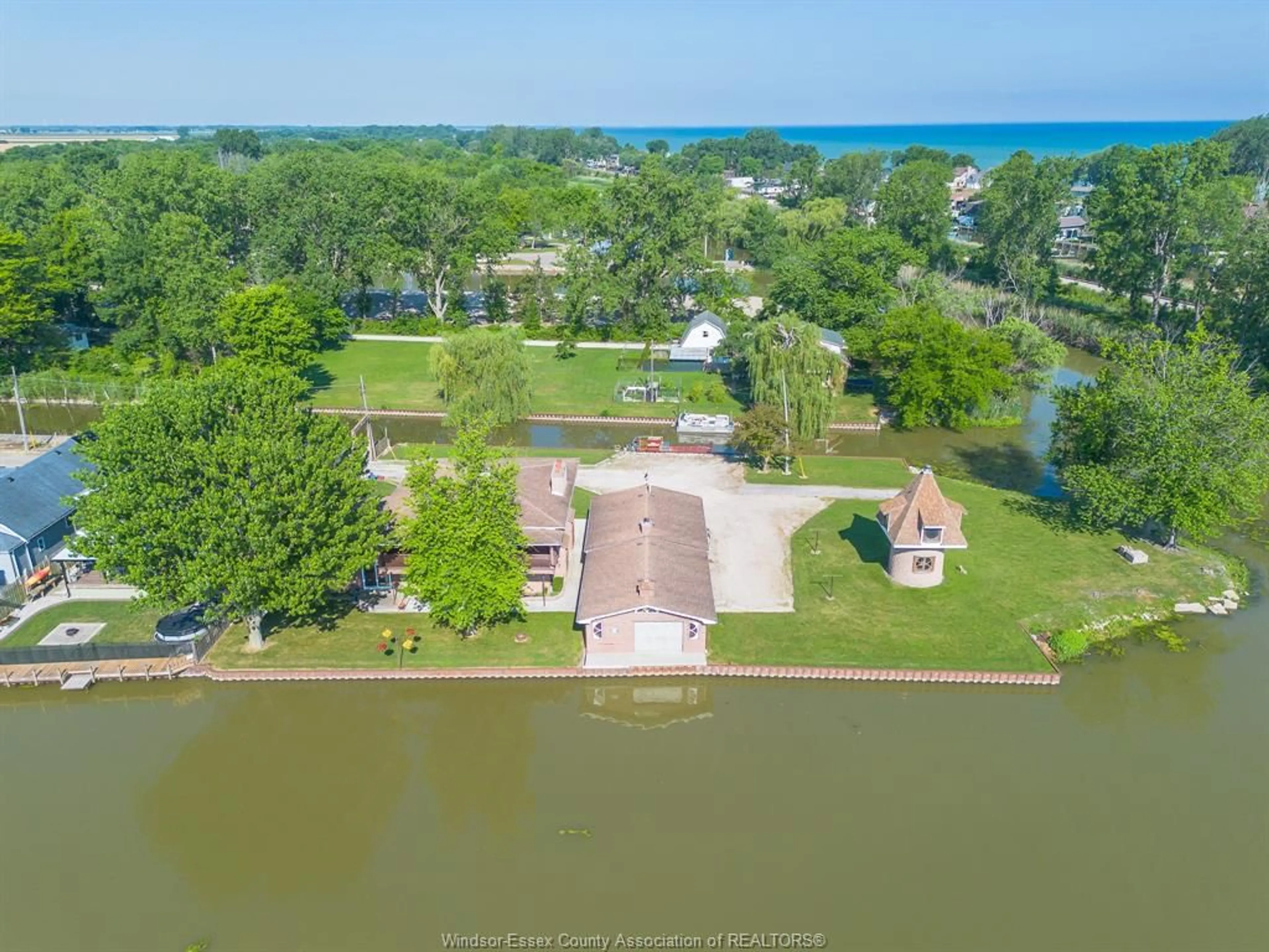 A pic from outside/outdoor area/front of a property/back of a property/a pic from drone, water/lake/river/ocean view for 194 RIVERSIDE Rd, Lakeshore Ontario N0R 1A0