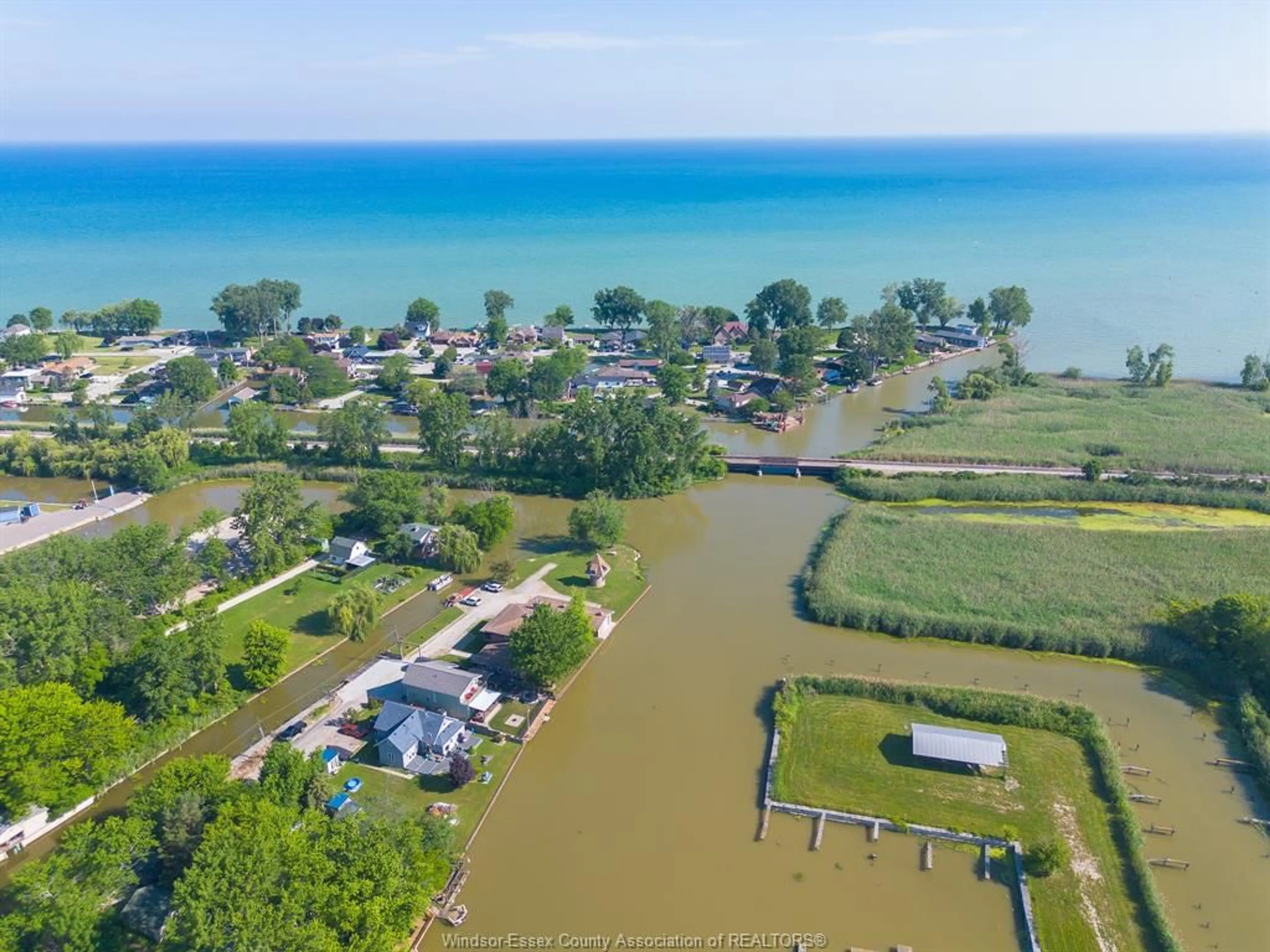 A pic from outside/outdoor area/front of a property/back of a property/a pic from drone, water/lake/river/ocean view for 194 RIVERSIDE Rd, Lakeshore Ontario N0R 1A0