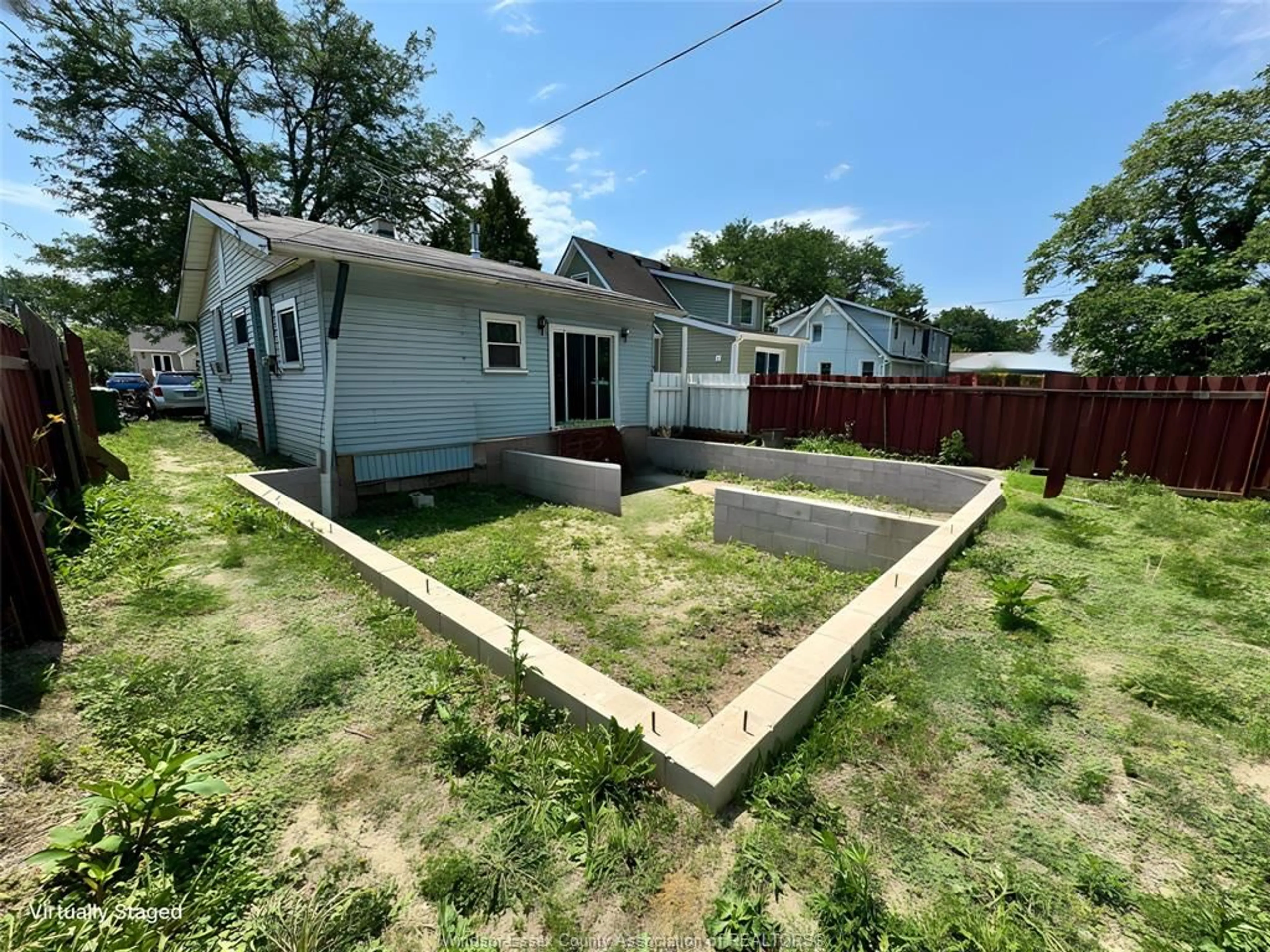 A pic from outside/outdoor area/front of a property/back of a property/a pic from drone, street for 686 Stanley, Windsor Ontario N8X 3B2