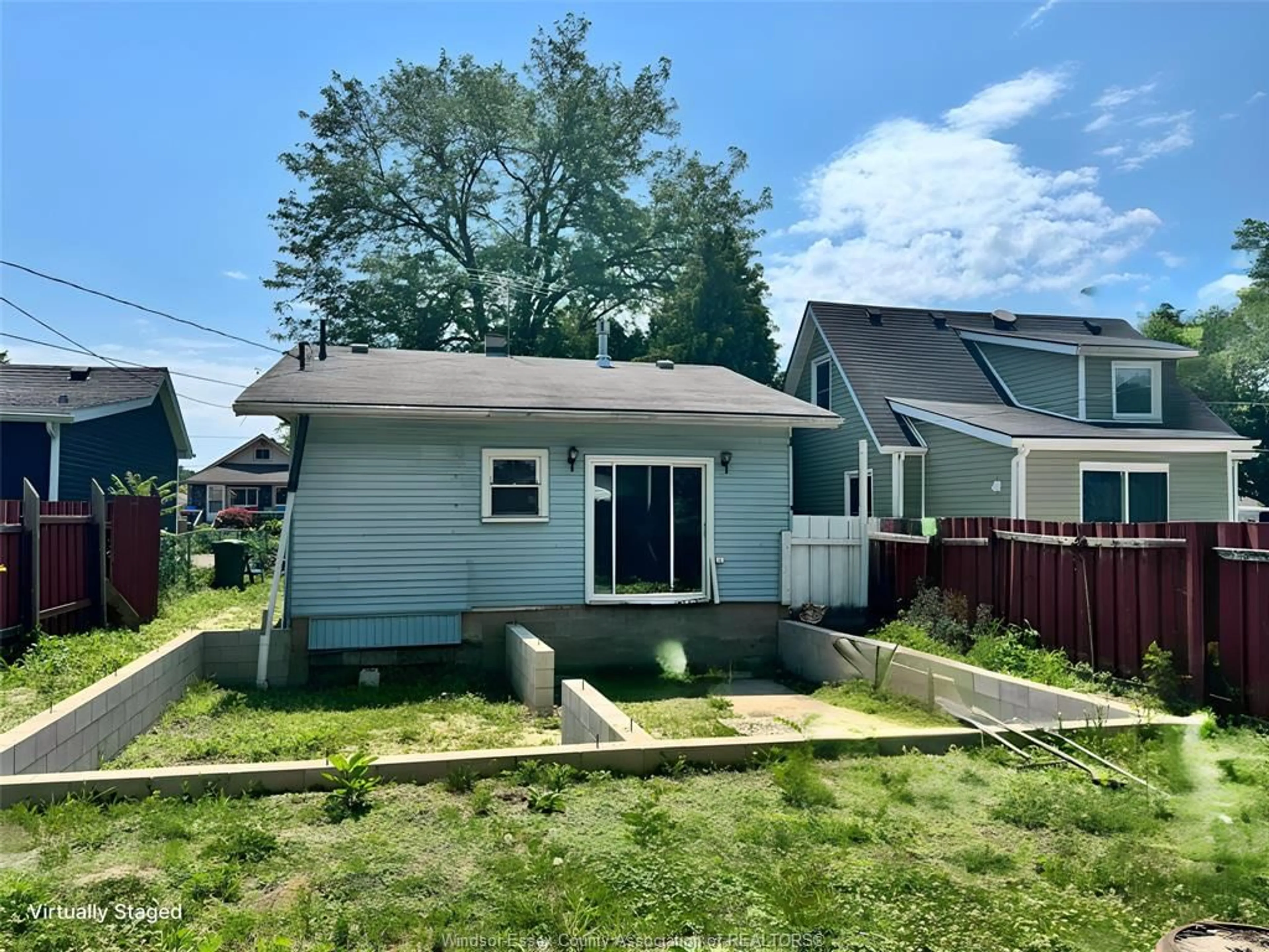 A pic from outside/outdoor area/front of a property/back of a property/a pic from drone, street for 686 Stanley, Windsor Ontario N8X 3B2