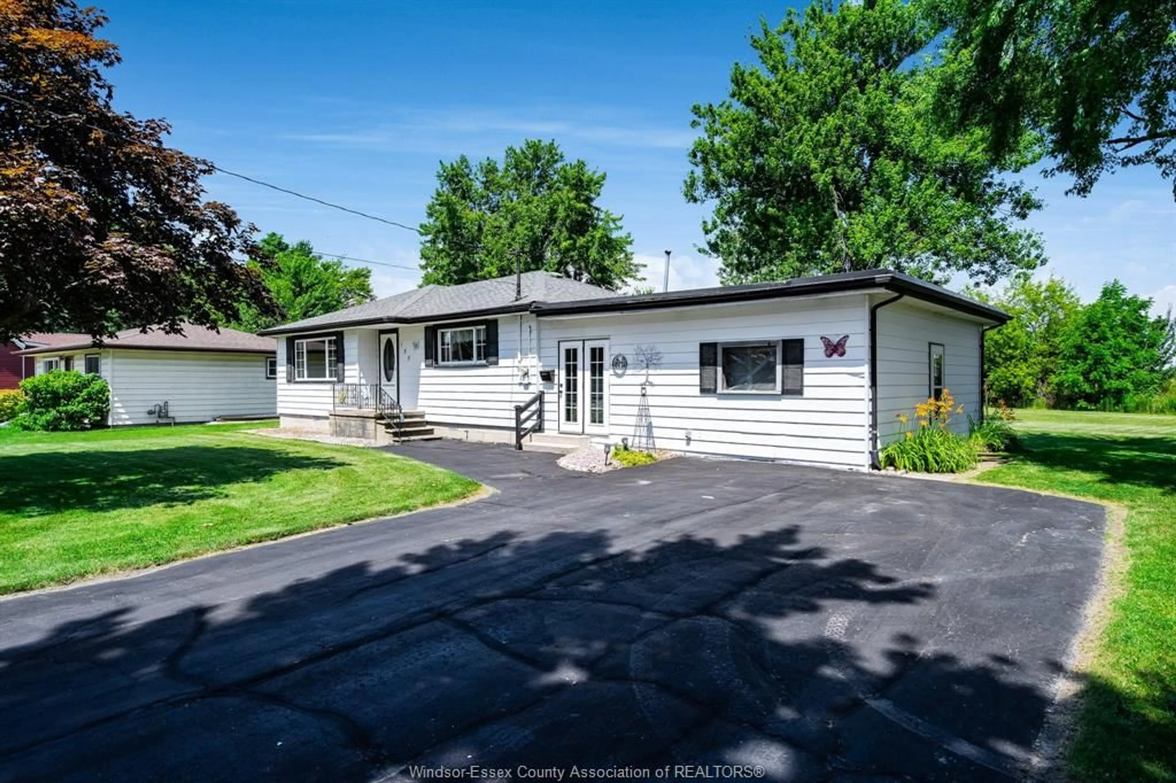 Home with vinyl exterior material, street for 155 Arthur, Essex Ontario N8M 2N7