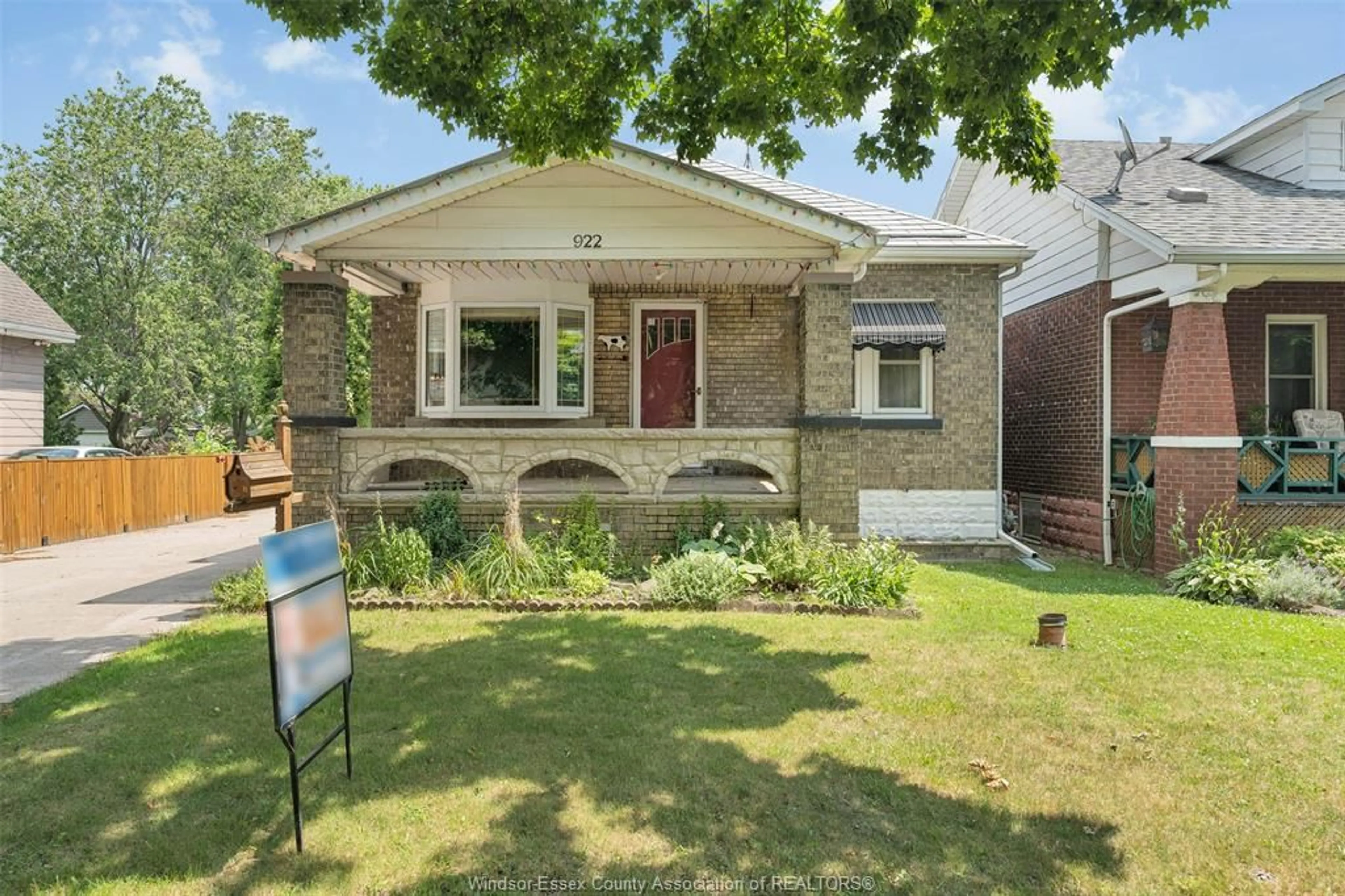 Home with brick exterior material, street for 922 FORD Blvd, Windsor Ontario N8S 2E9
