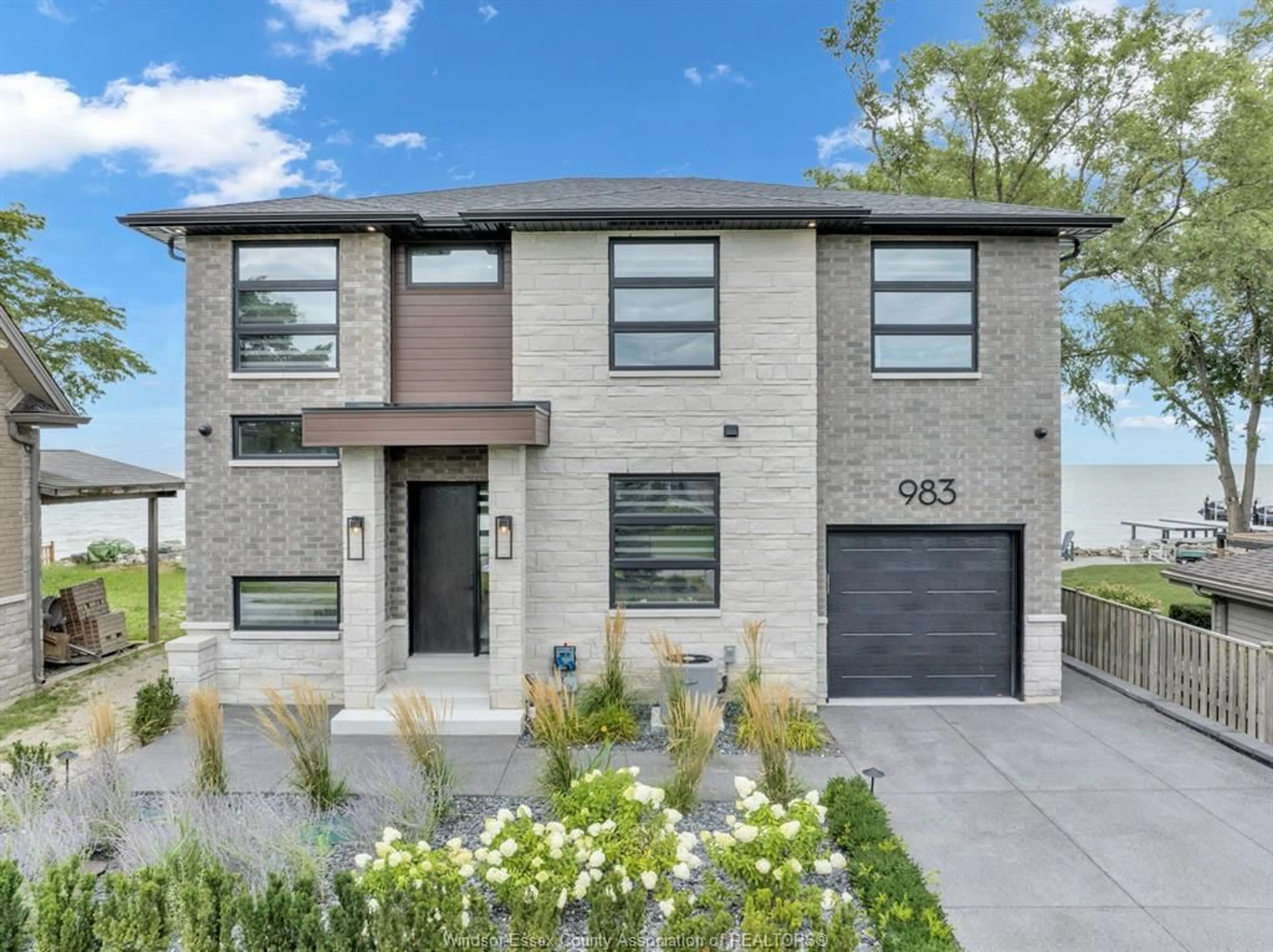Home with brick exterior material, street for 983 LAKESHORE PARK Rd, Lakeshore Ontario N0R 1A0