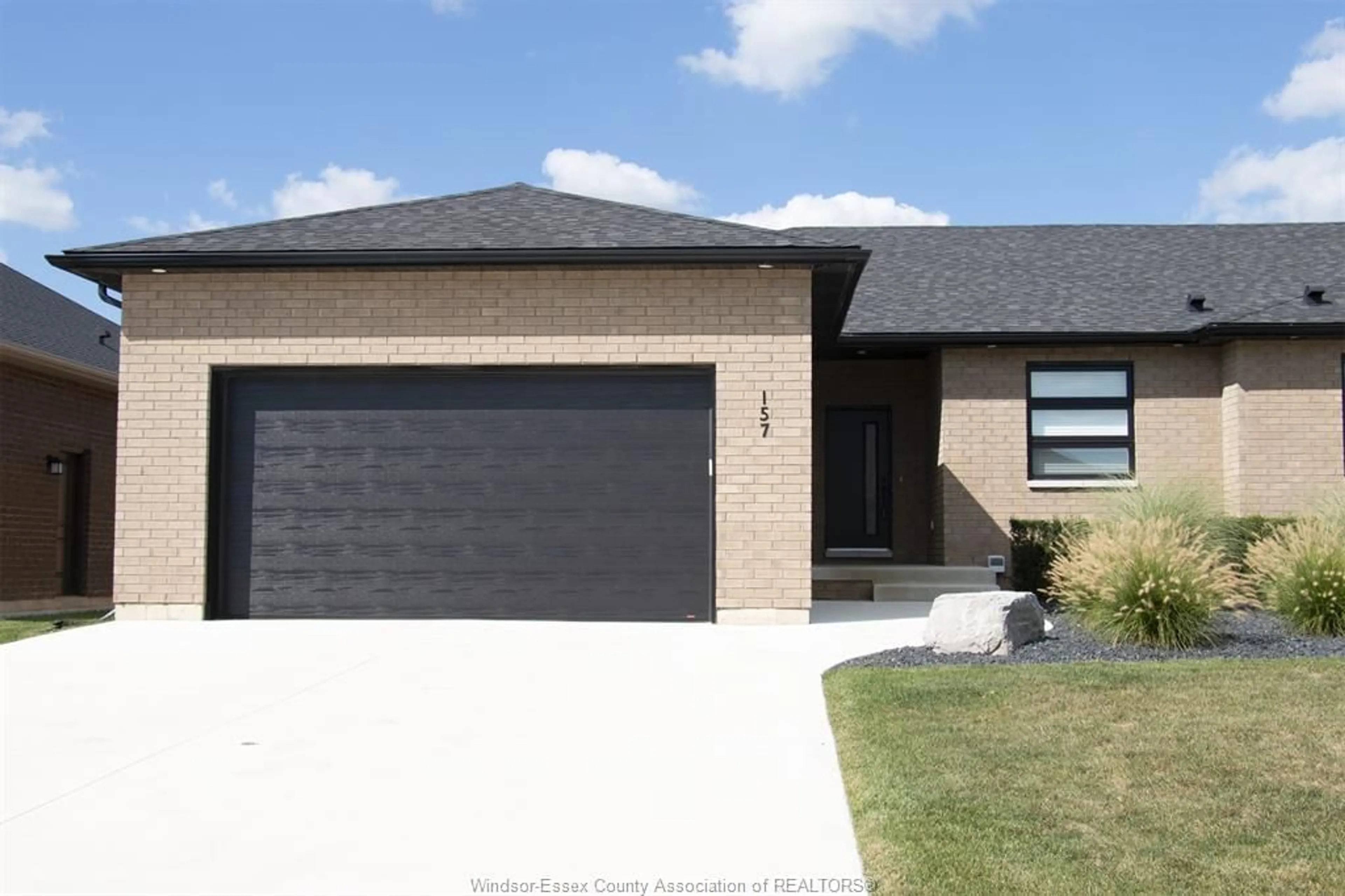 Home with brick exterior material, street for 157 BLUE JAY CRESCENT, Kingsville Ontario N9Y 0E3