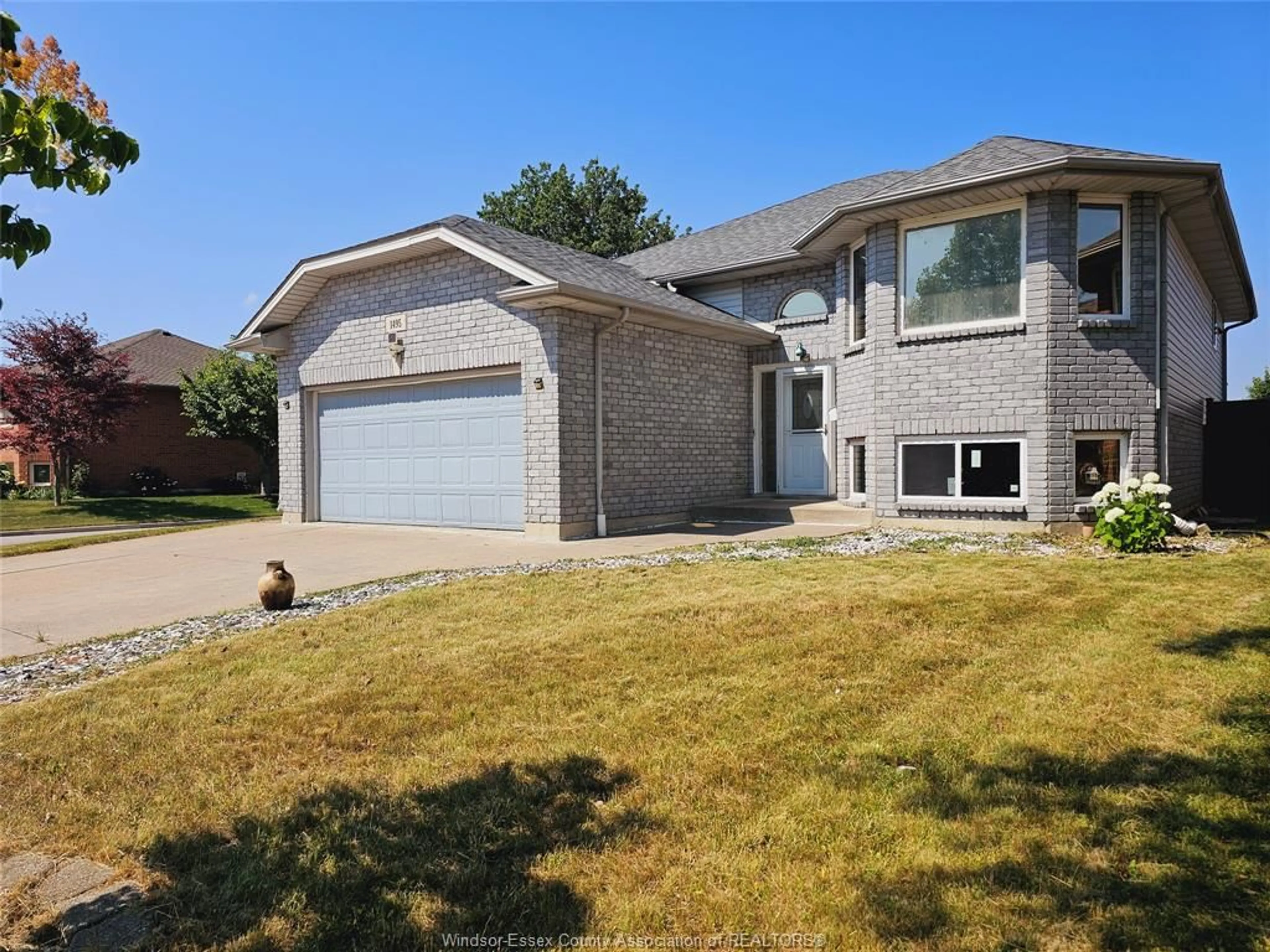 Home with brick exterior material, street for 1495 CLOVER, Windsor Ontario N8P 1R2