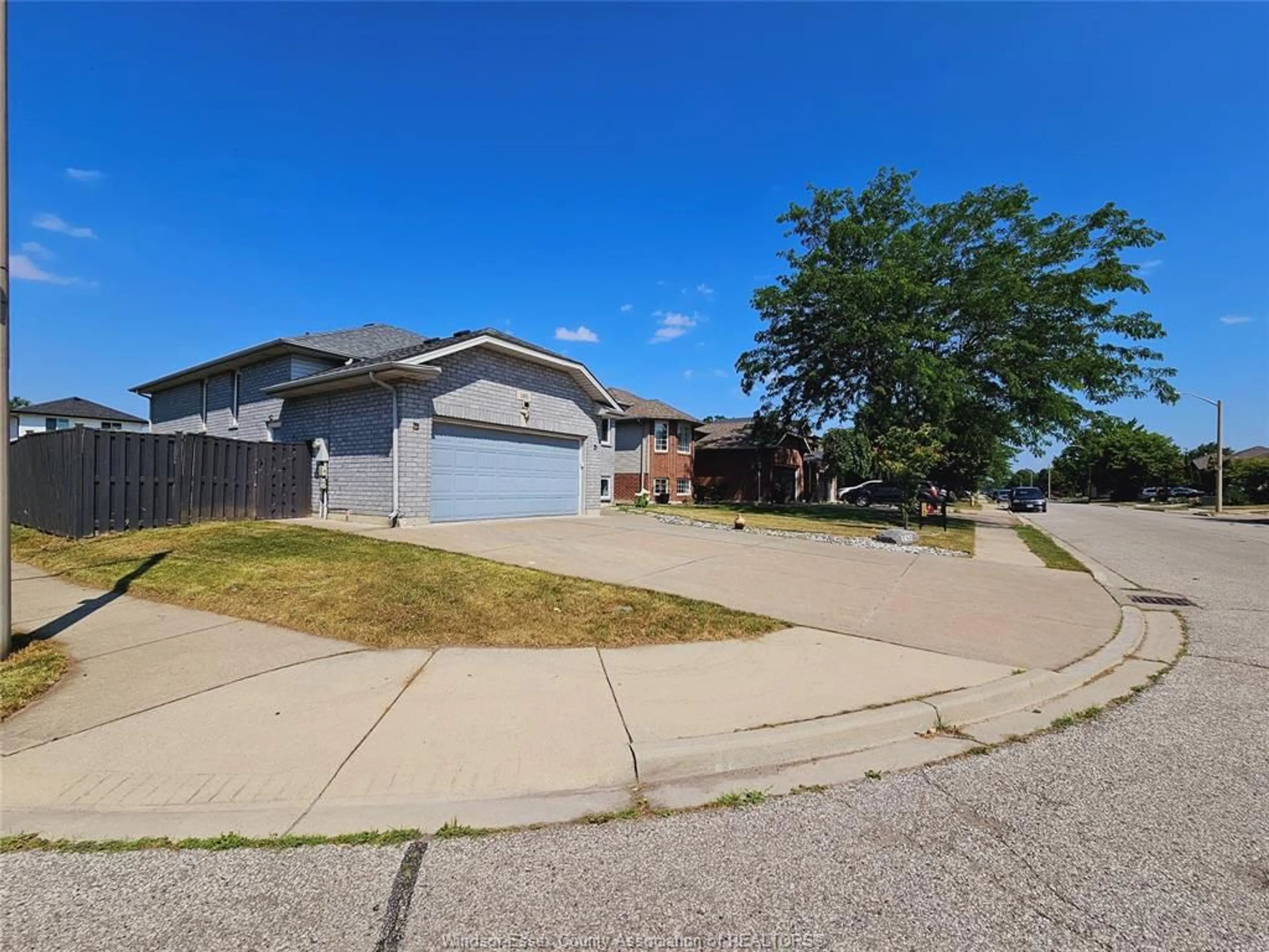 A pic from outside/outdoor area/front of a property/back of a property/a pic from drone, street for 1495 CLOVER, Windsor Ontario N8P 1R2