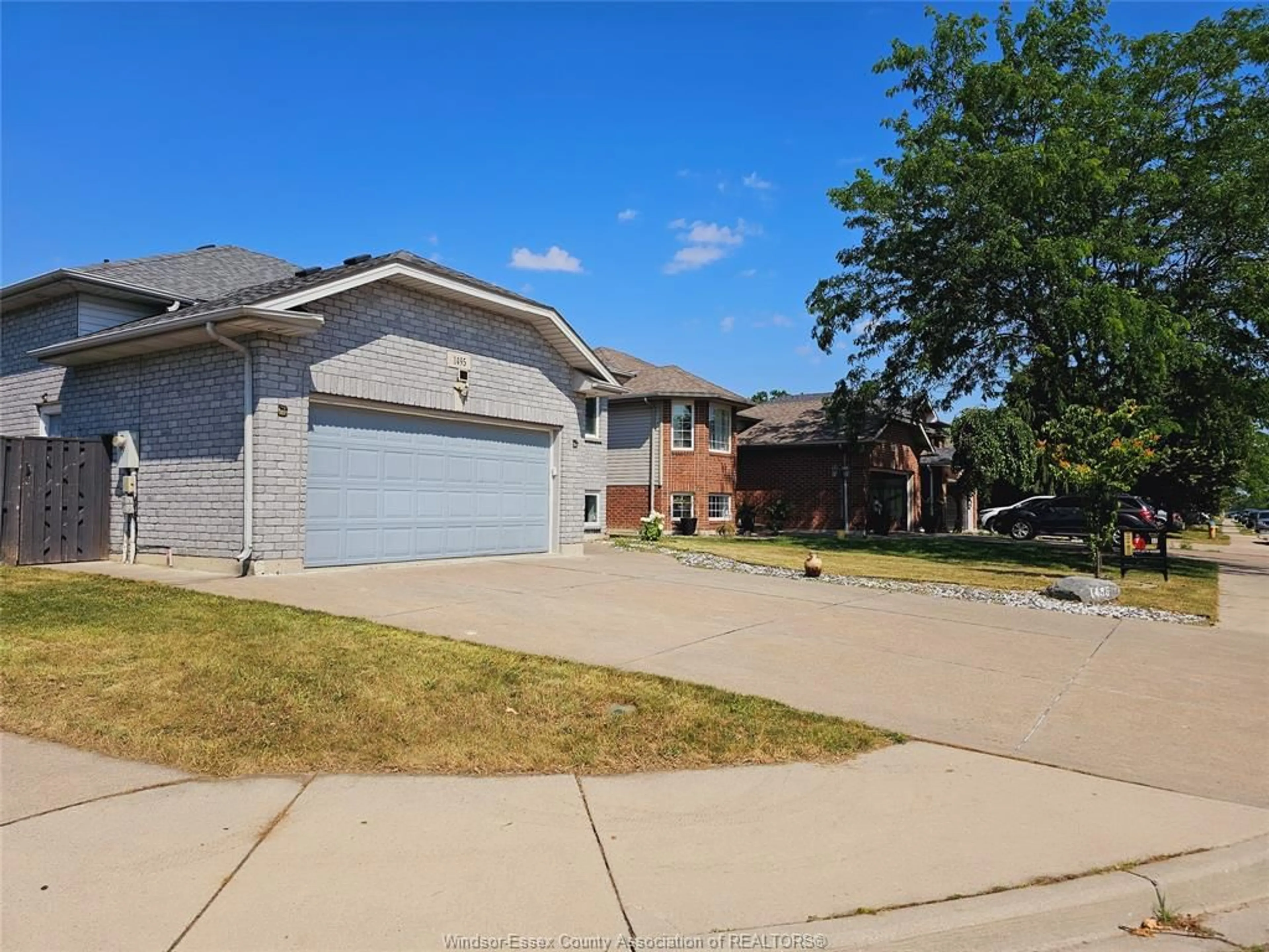 A pic from outside/outdoor area/front of a property/back of a property/a pic from drone, street for 1495 CLOVER, Windsor Ontario N8P 1R2