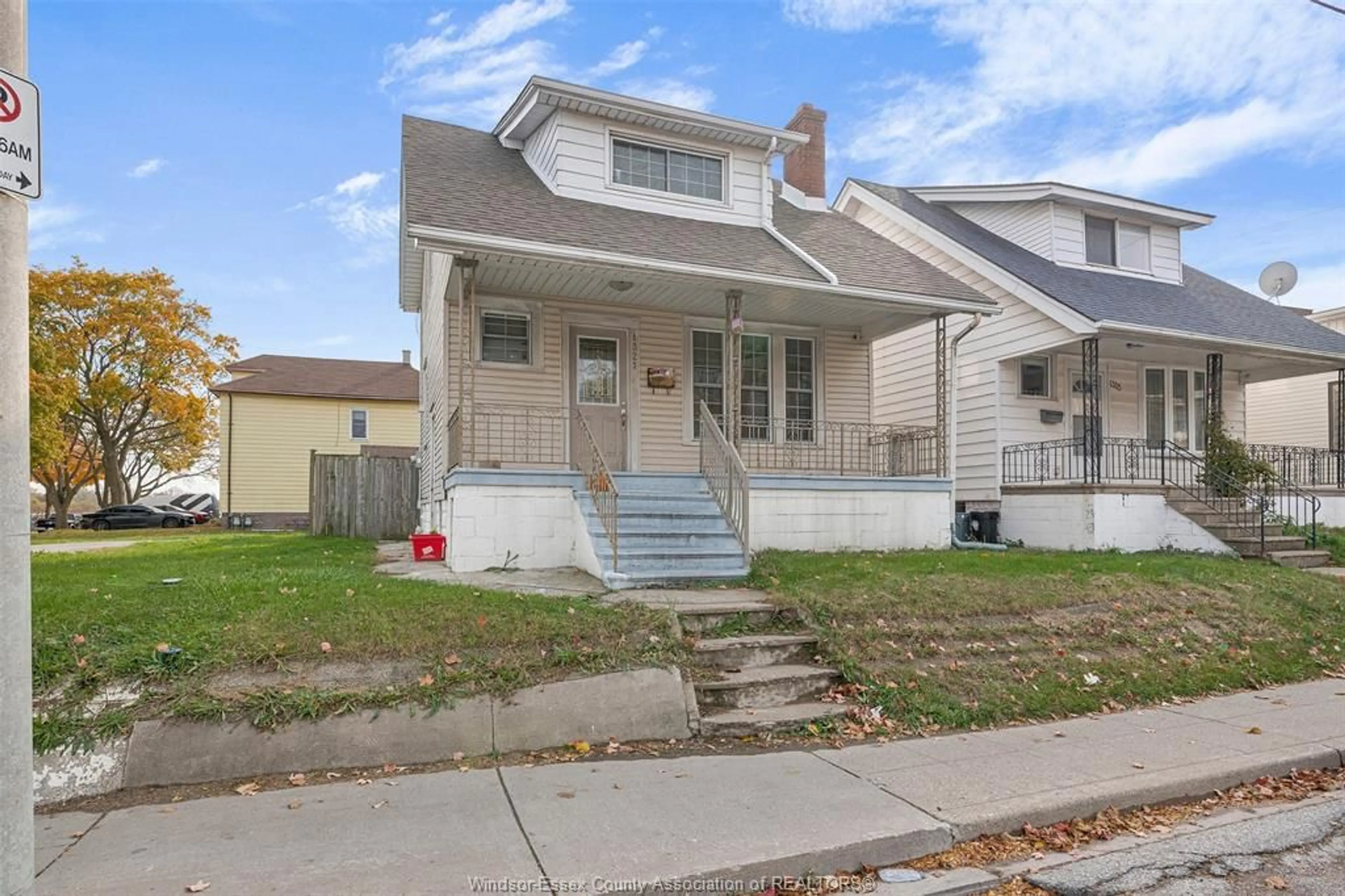 Home with vinyl exterior material, street for 1321 WYANDOTTE St, Windsor Ontario N9B 1H3
