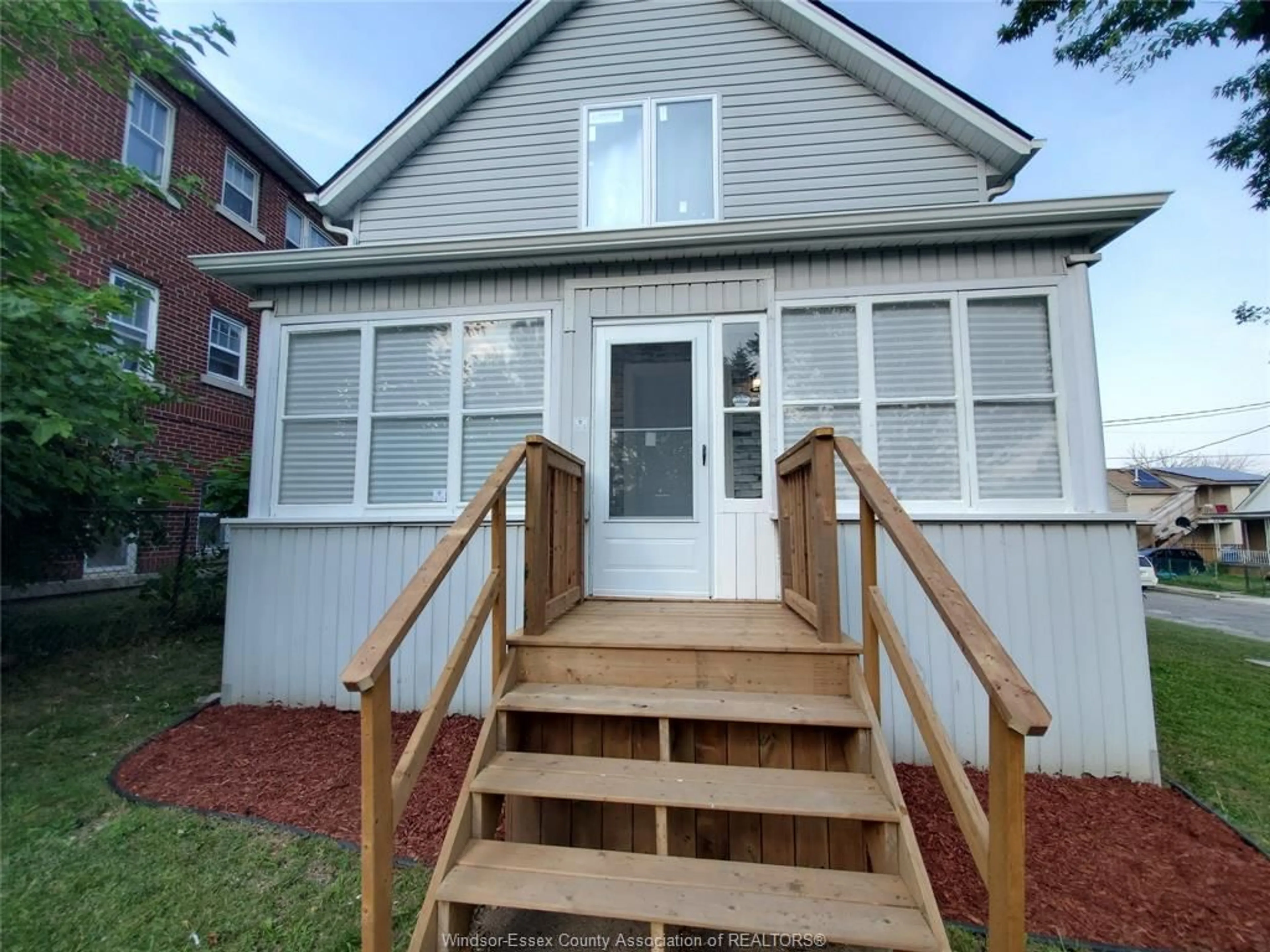 Home with vinyl exterior material, street for 488 PARENT Ave, Windsor Ontario N9A 2C1