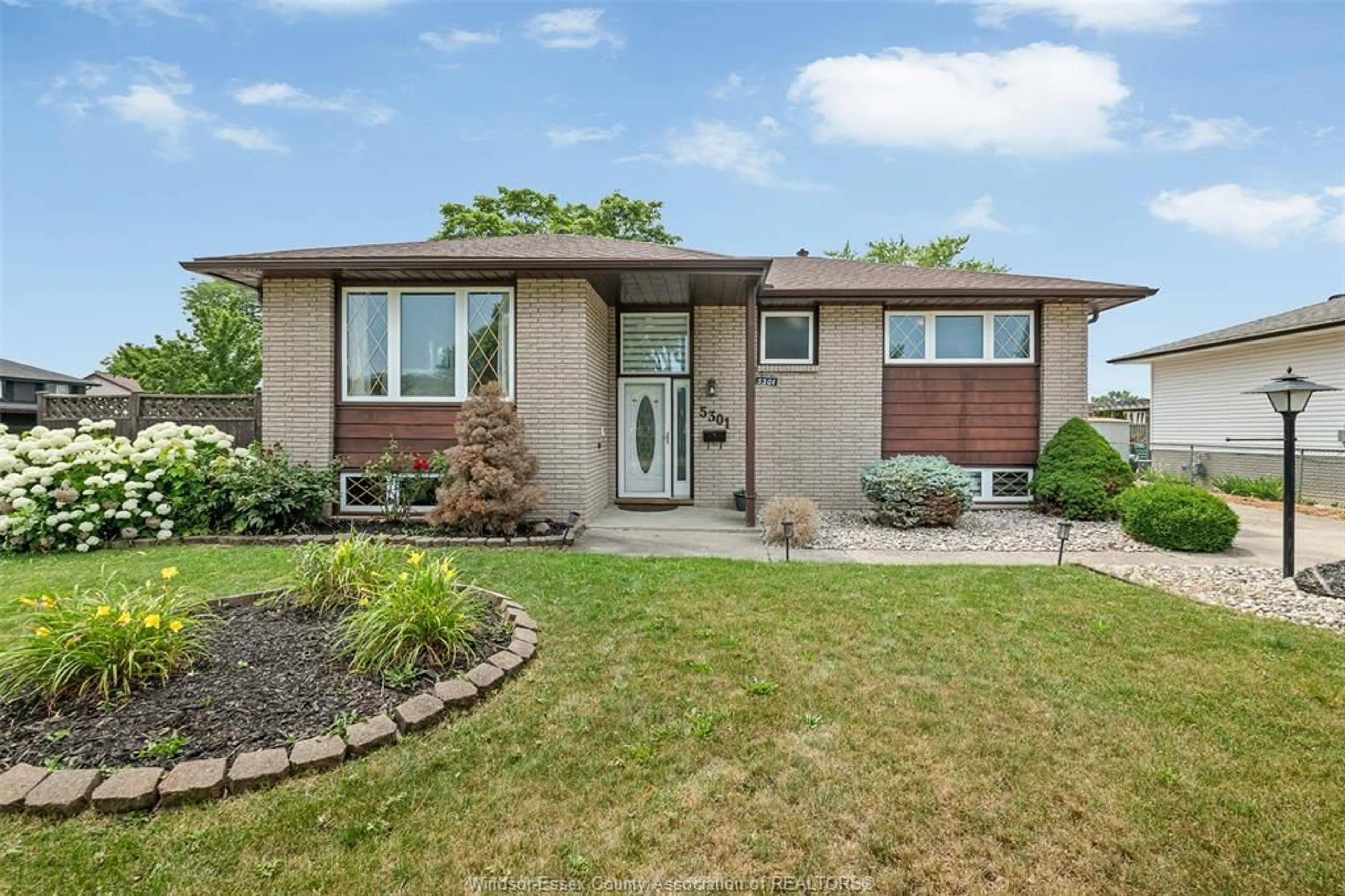 Home with vinyl exterior material, street for 5301 CLARENCE DRIVE, Windsor Ontario N8T 2H1