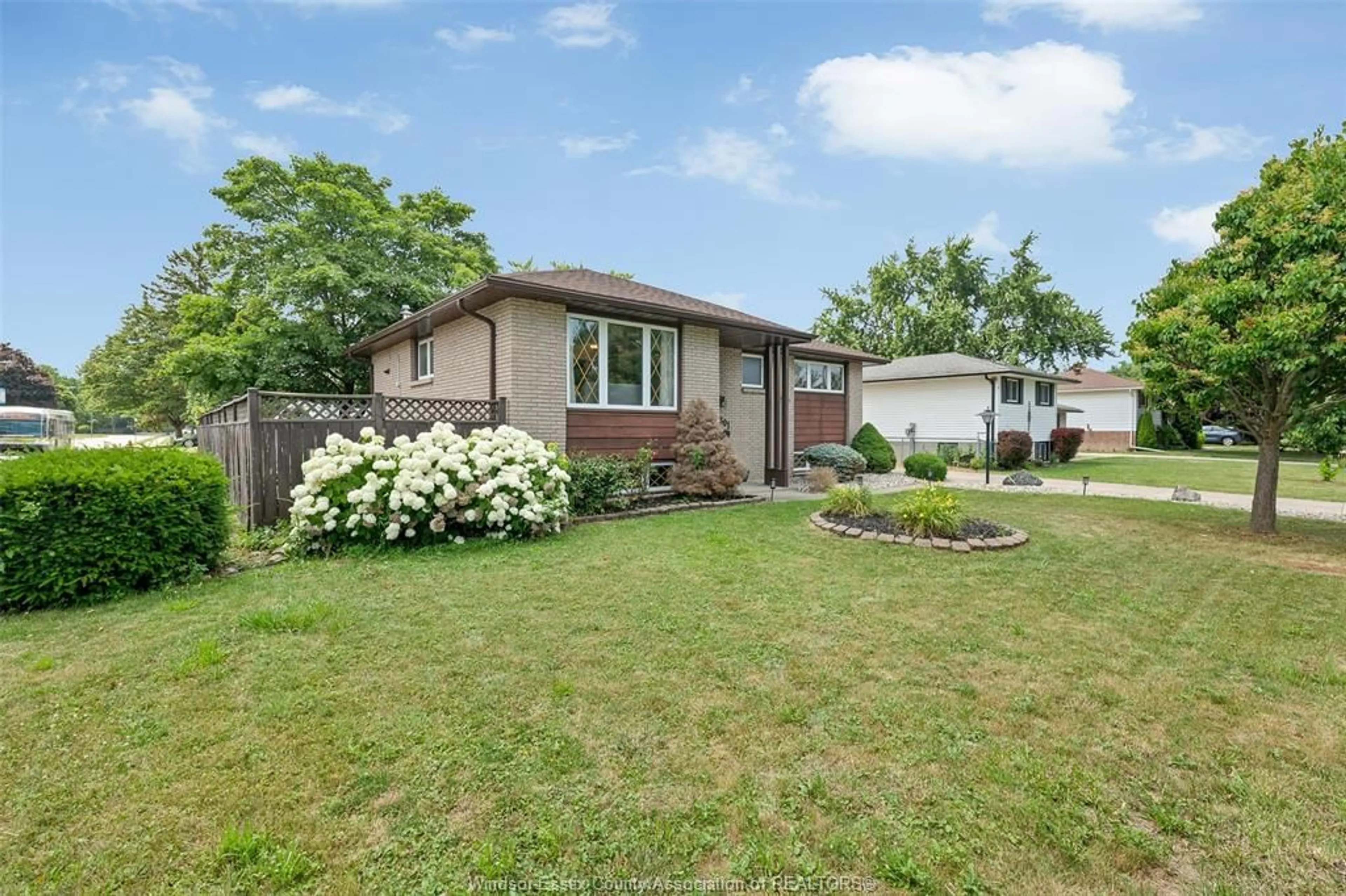 A pic from outside/outdoor area/front of a property/back of a property/a pic from drone, street for 5301 CLARENCE DRIVE, Windsor Ontario N8T 2H1