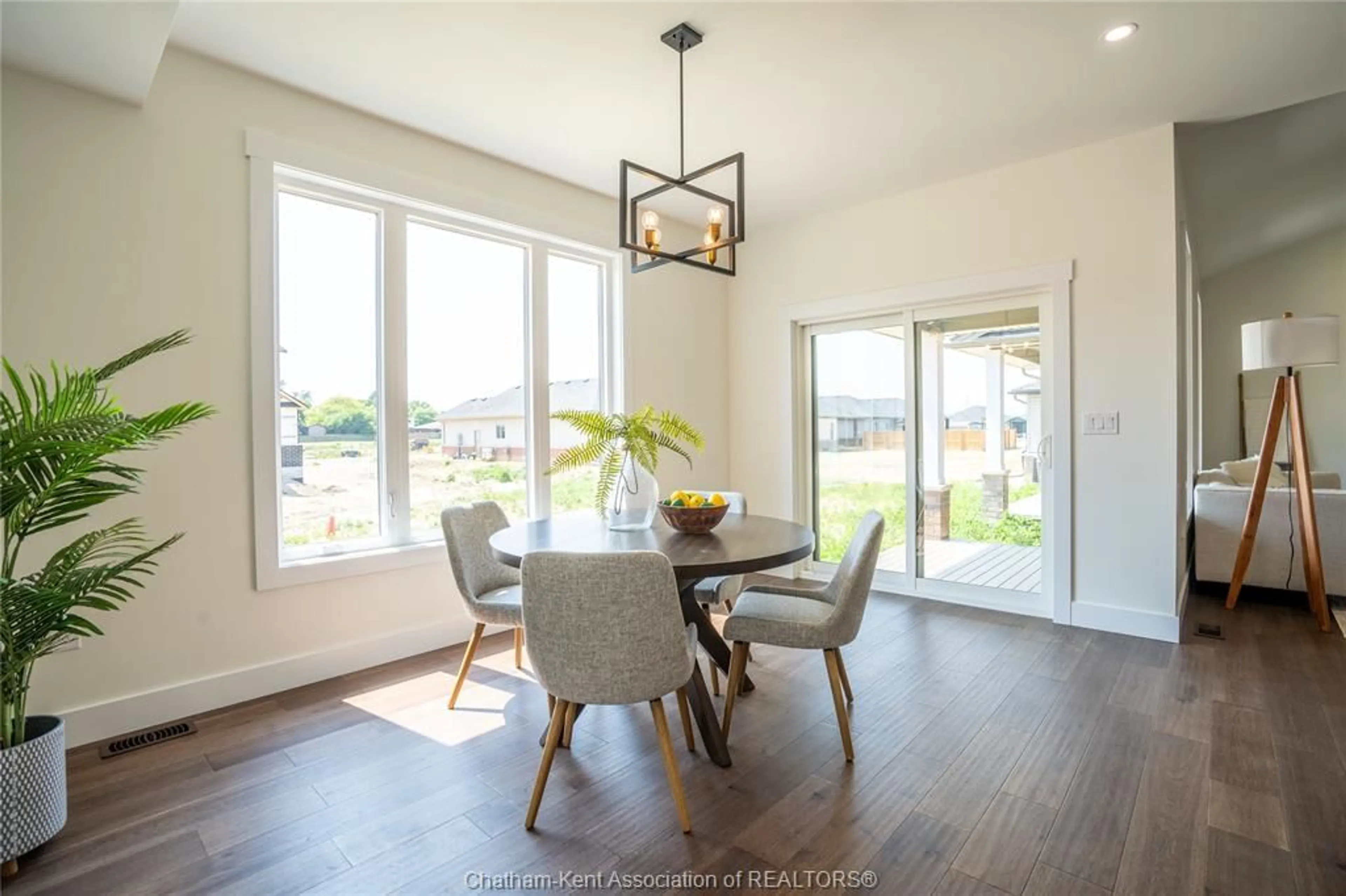 Dining room, wood/laminate floor for 128 Landings Pass, Chatham Ontario N7L 0A4
