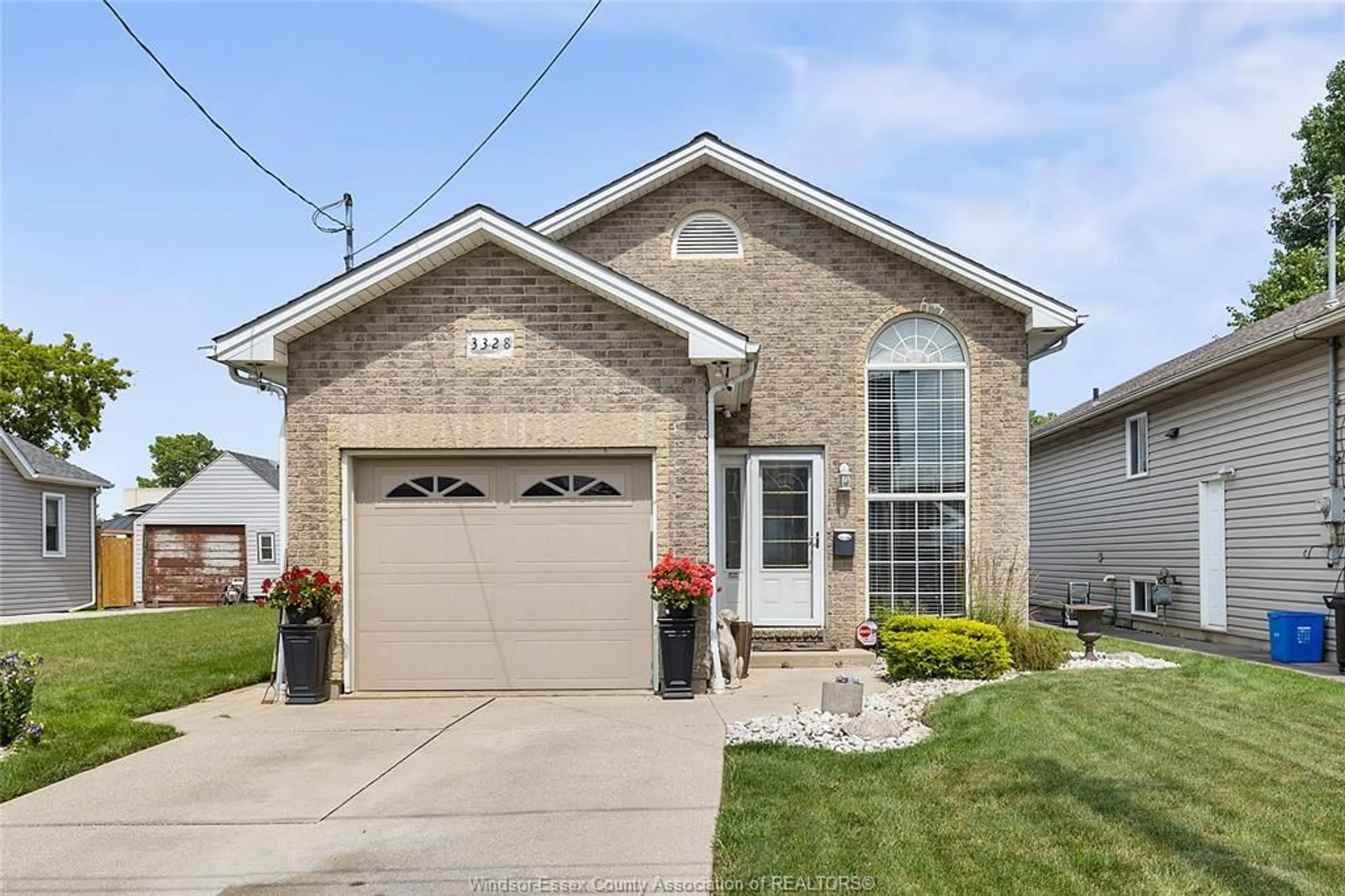 Home with brick exterior material, street for 3328 Riberdy Rd, Windsor Ontario N8W 3V2