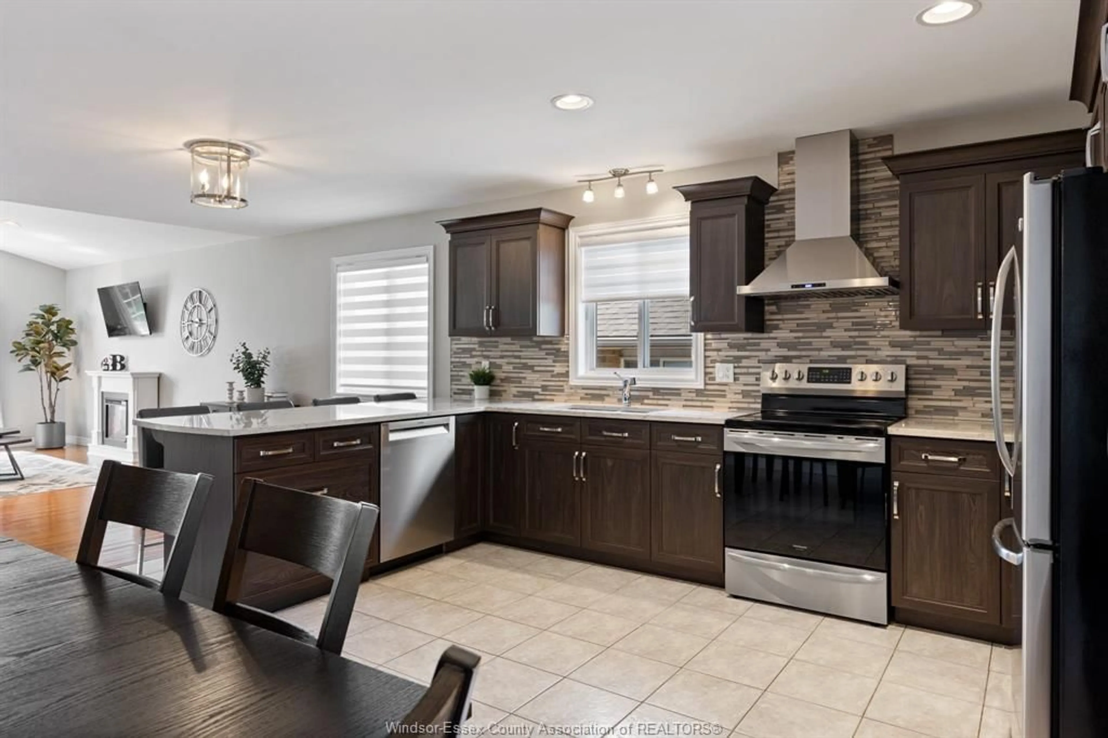 Open concept kitchen, ceramic/tile floor for 830 REVLAND, Tecumseh Ontario N8N 5B2