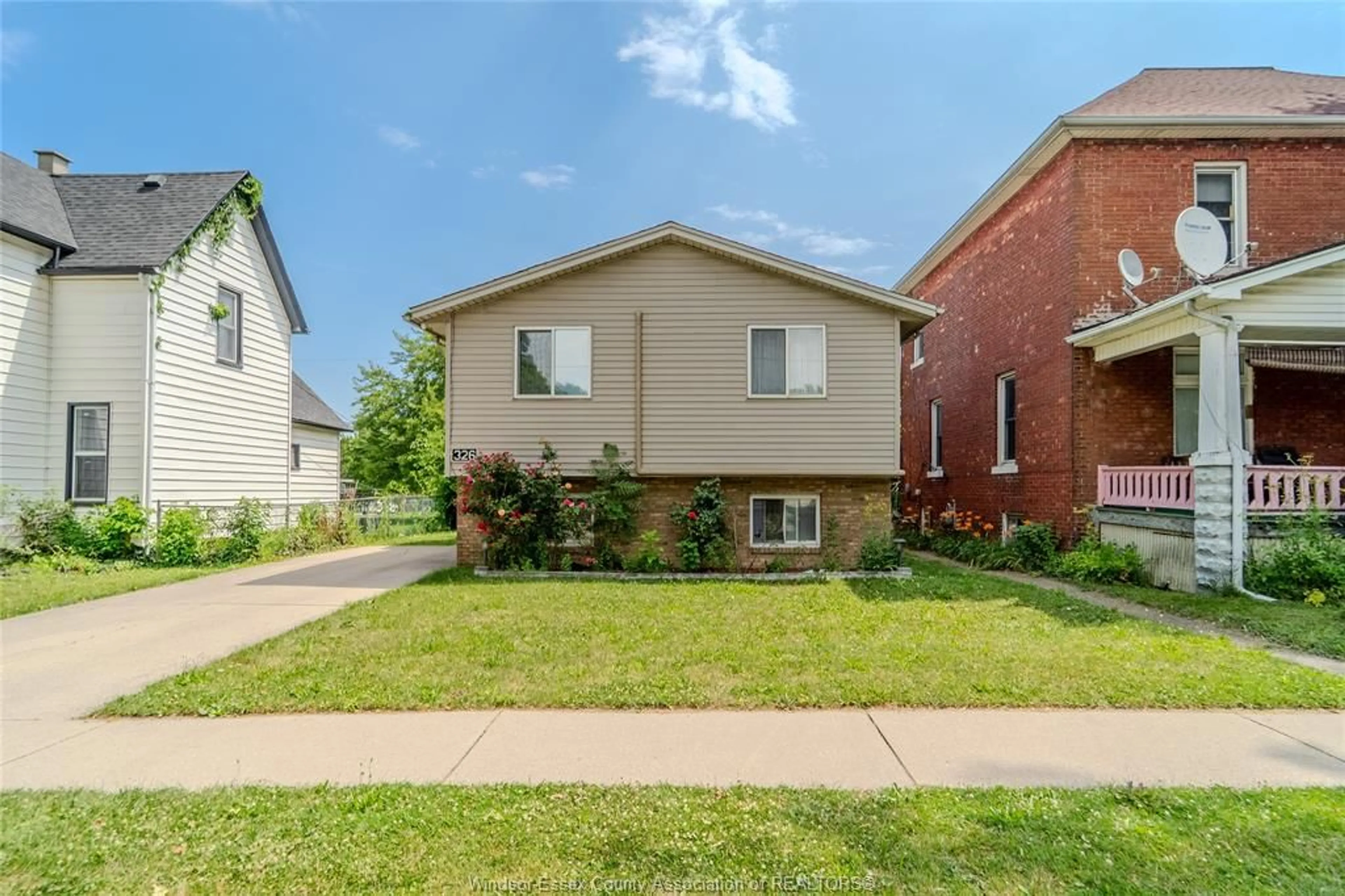 Home with brick exterior material, street for 326 Langlois, Windsor Ontario N9A 2G1