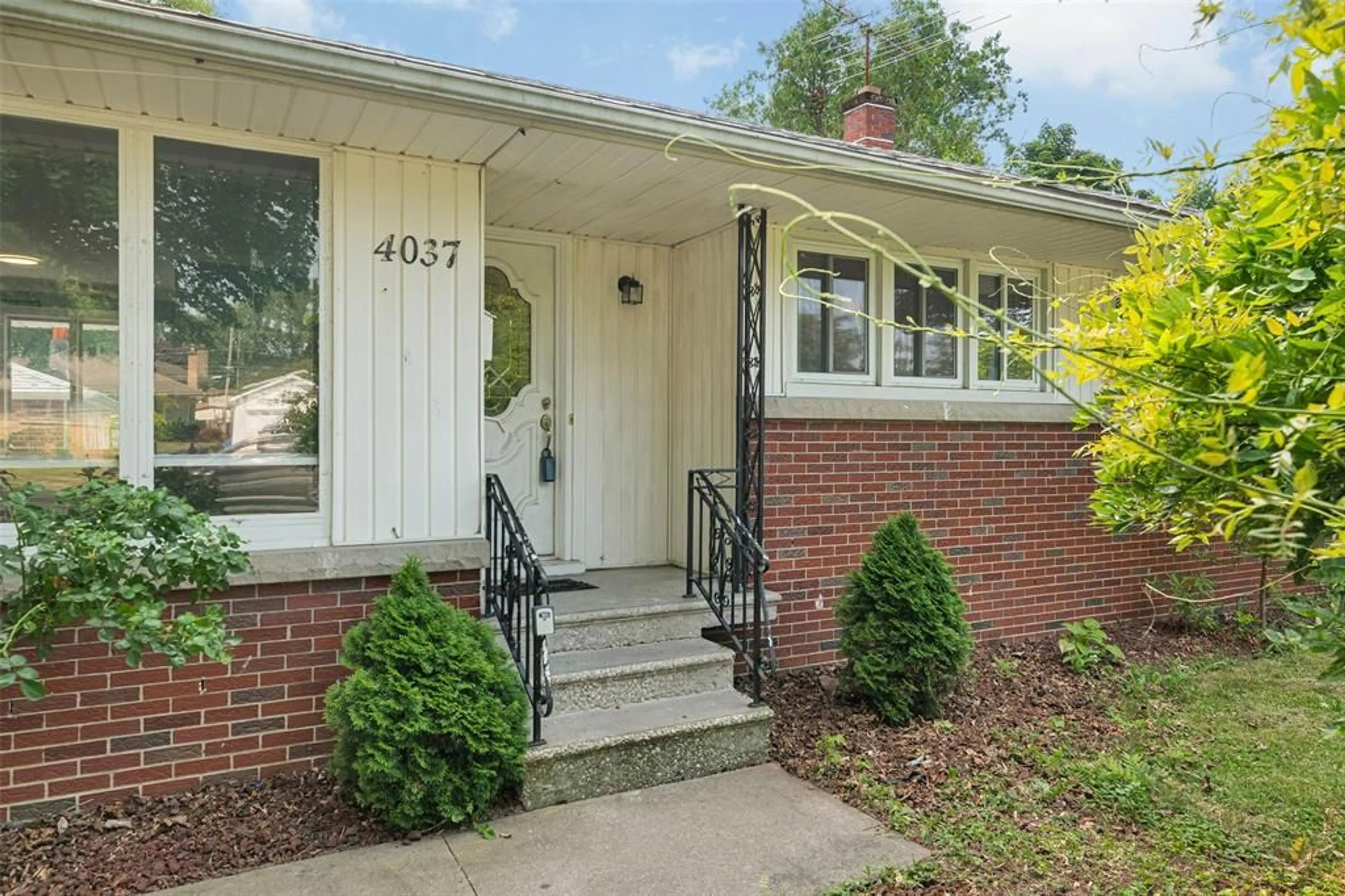 Home with brick exterior material, street for 4037 MOUNT ROYAL Dr, Windsor Ontario N9G 2C1
