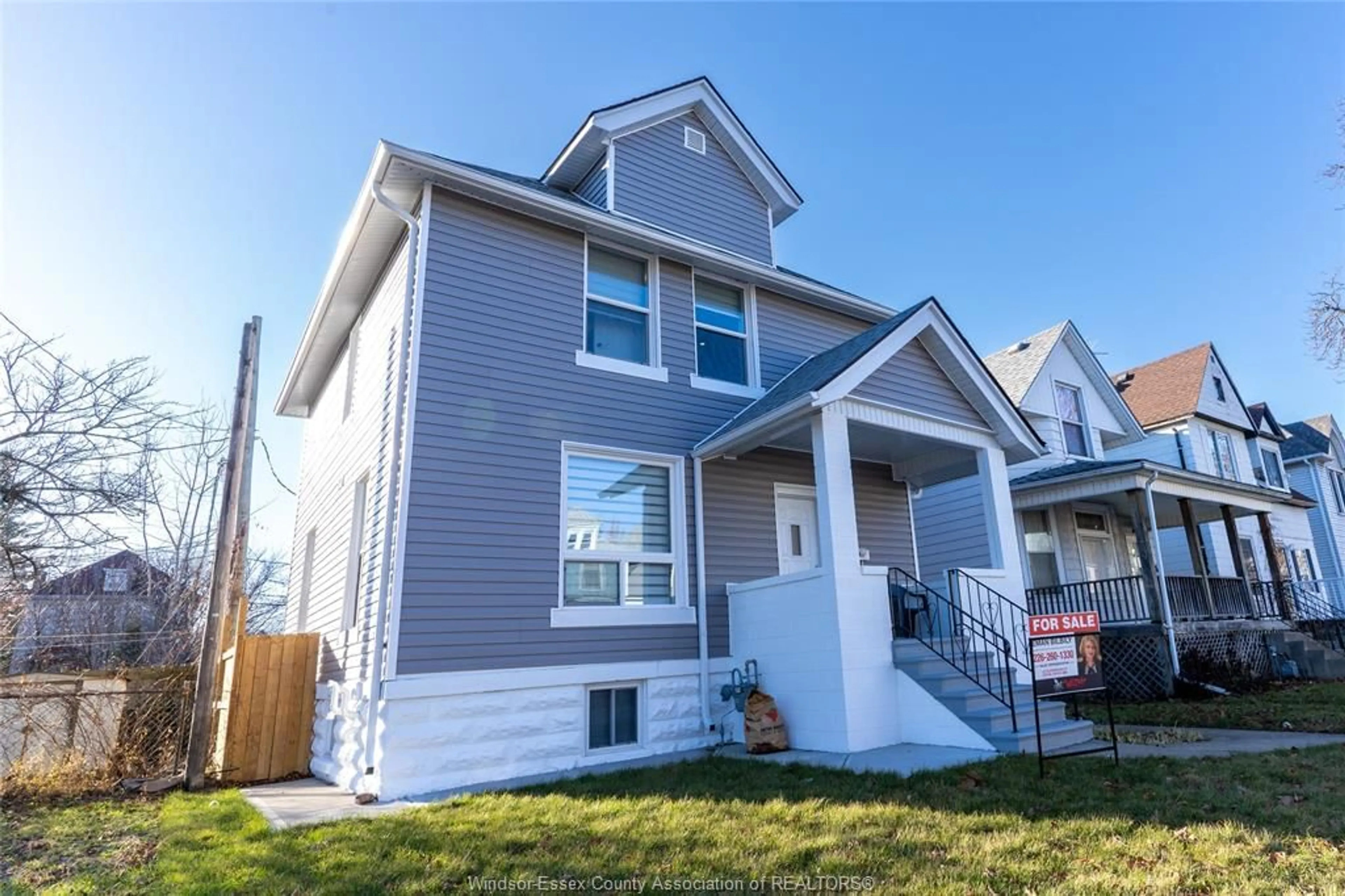 Home with vinyl exterior material, street for 765 DOUGALL, Windsor Ontario N9A 4P9