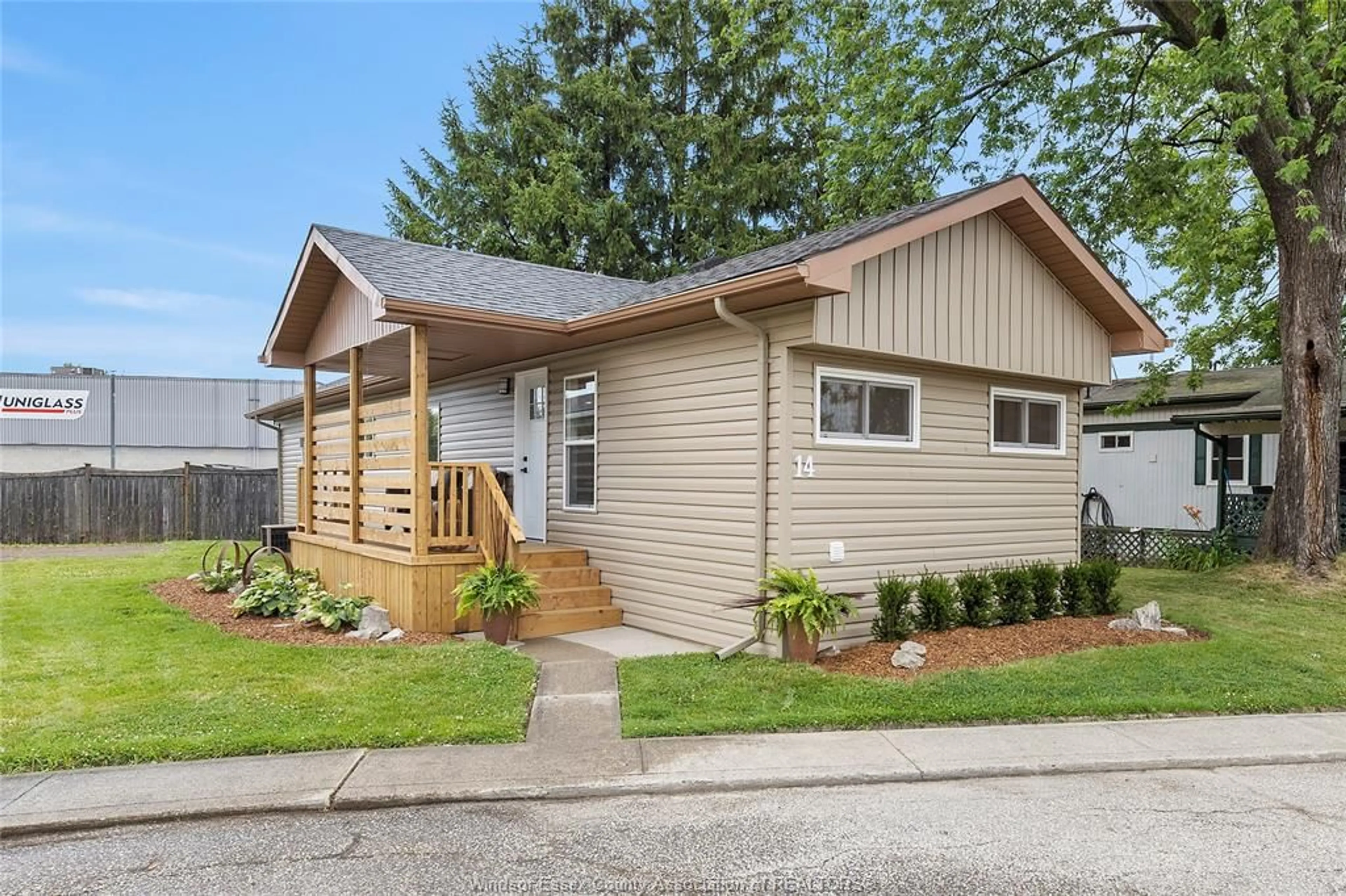 Home with vinyl exterior material, street for 14 ROBIN Cres, Lakeshore Ontario N0R 1A0