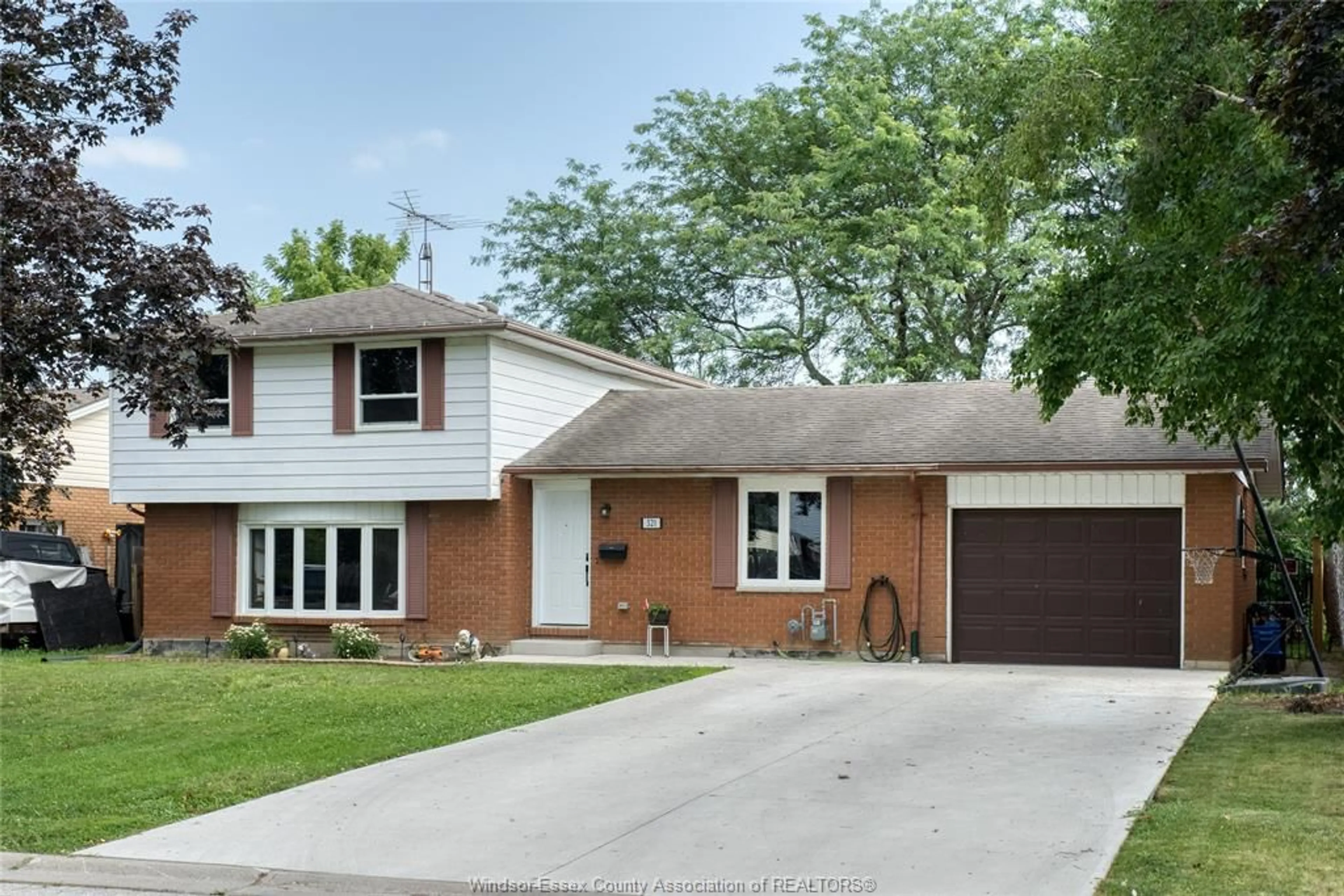 Home with brick exterior material, street for 321 MCCURDY, Amherstburg Ontario N9V 3B8