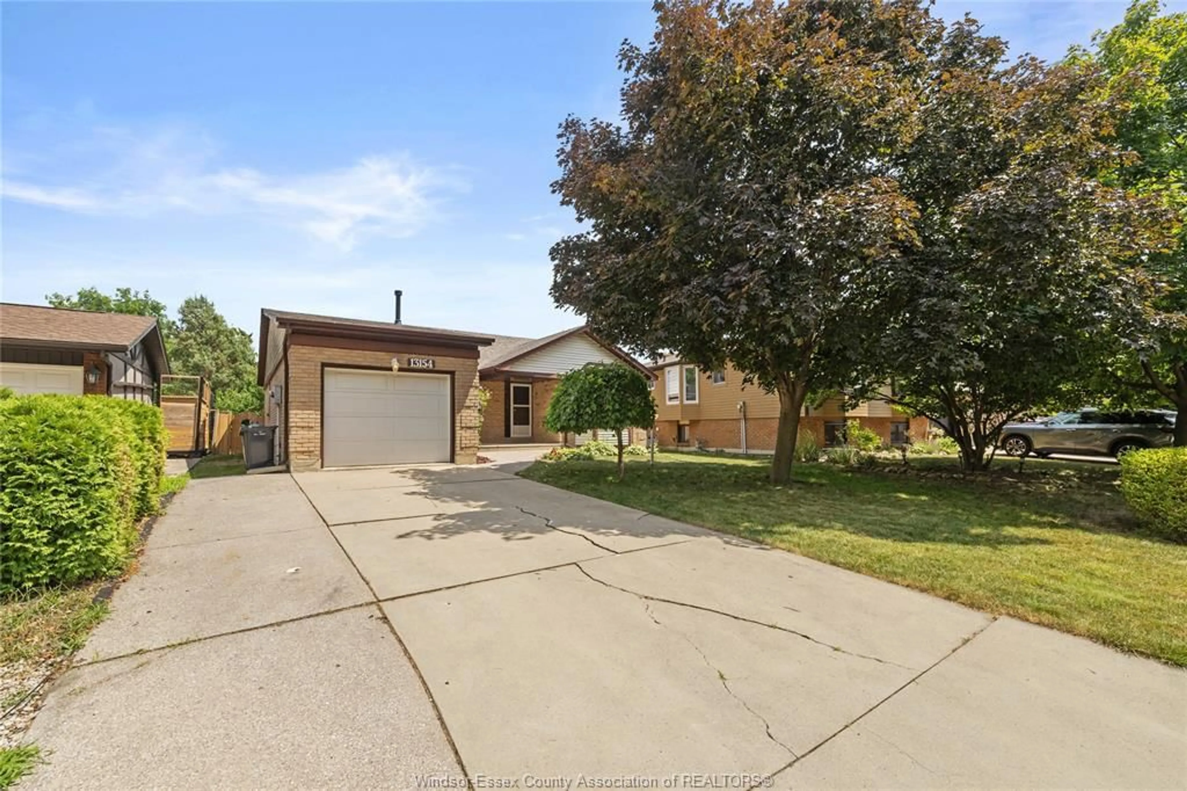 A pic from outside/outdoor area/front of a property/back of a property/a pic from drone, street for 13154 DILLON Dr, Tecumseh Ontario N8N 3M9