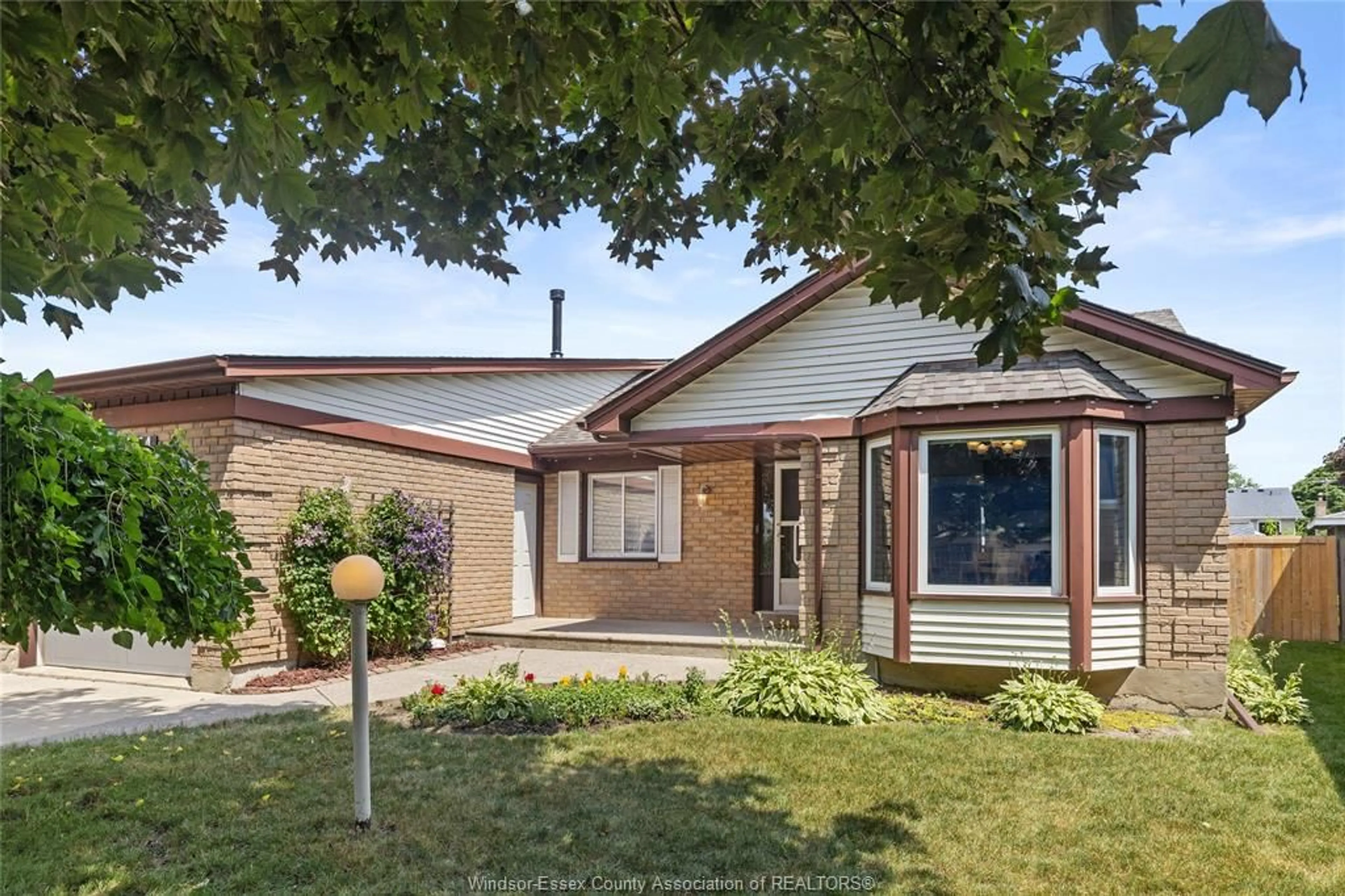 Home with brick exterior material, street for 13154 DILLON Dr, Tecumseh Ontario N8N 3M9