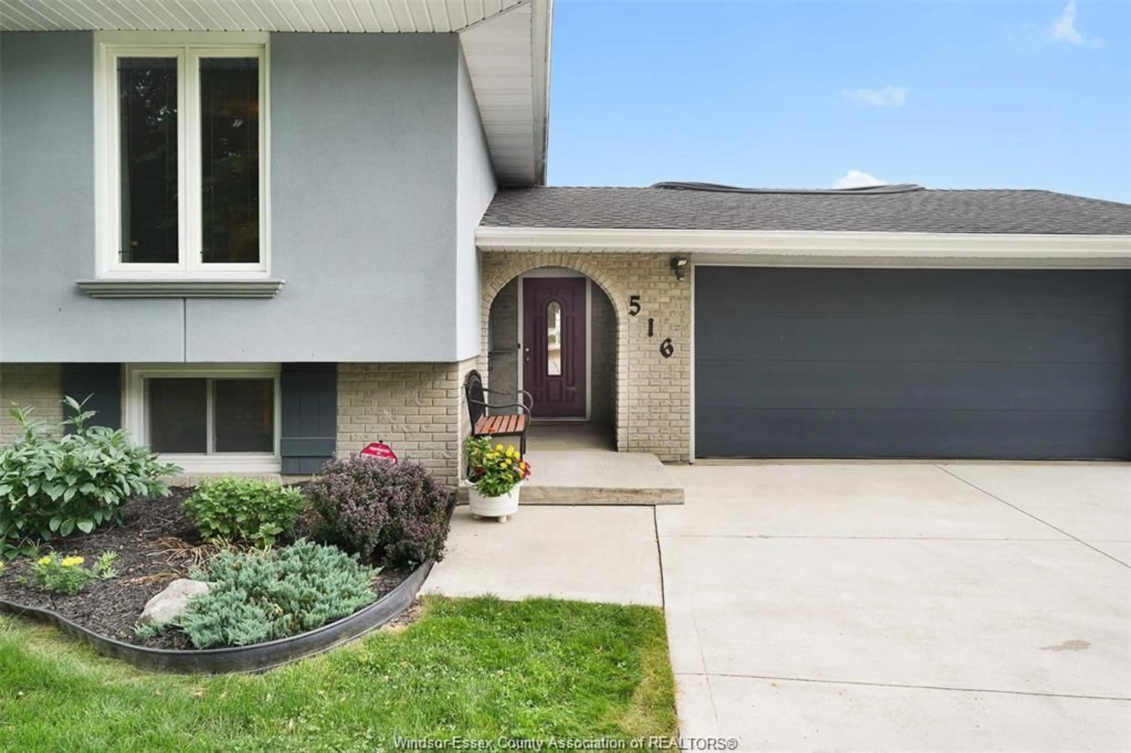 Home with vinyl exterior material, street for 516 WELLWOOD Crt, Tecumseh Ontario N8N 5E2