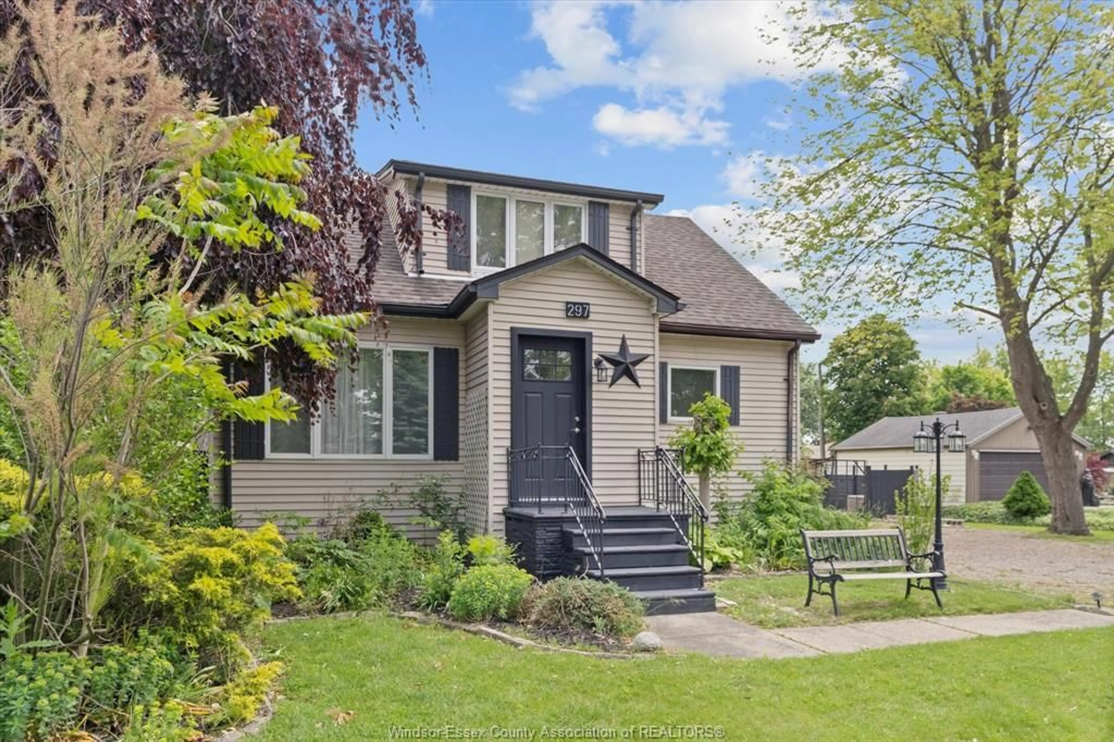 Home with vinyl exterior material, street for 297 Talbot, Essex Ontario N8M 1C2
