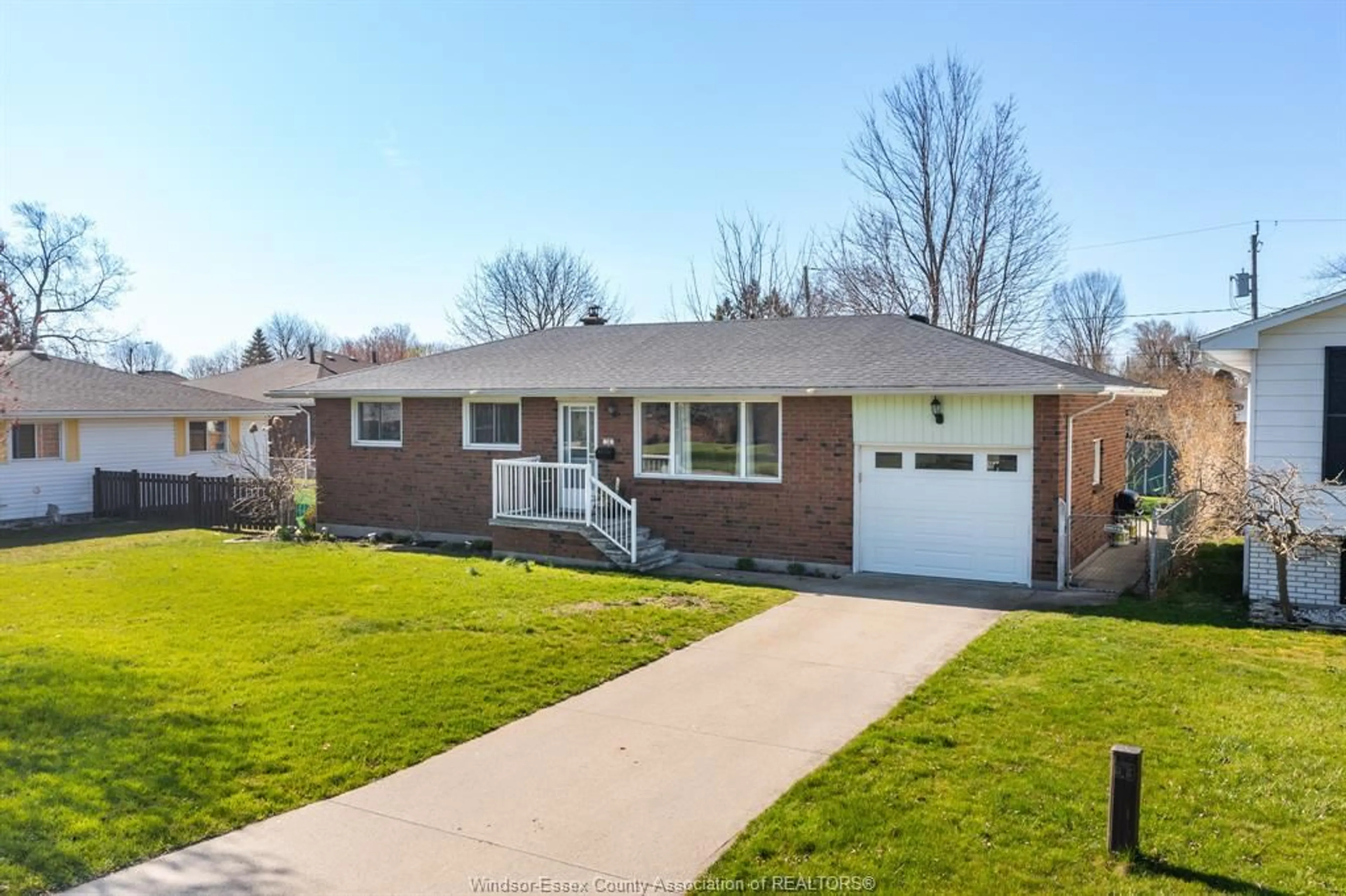 Home with brick exterior material, street for 38 BRUCE Ave, Leamington Ontario N8H 4C5