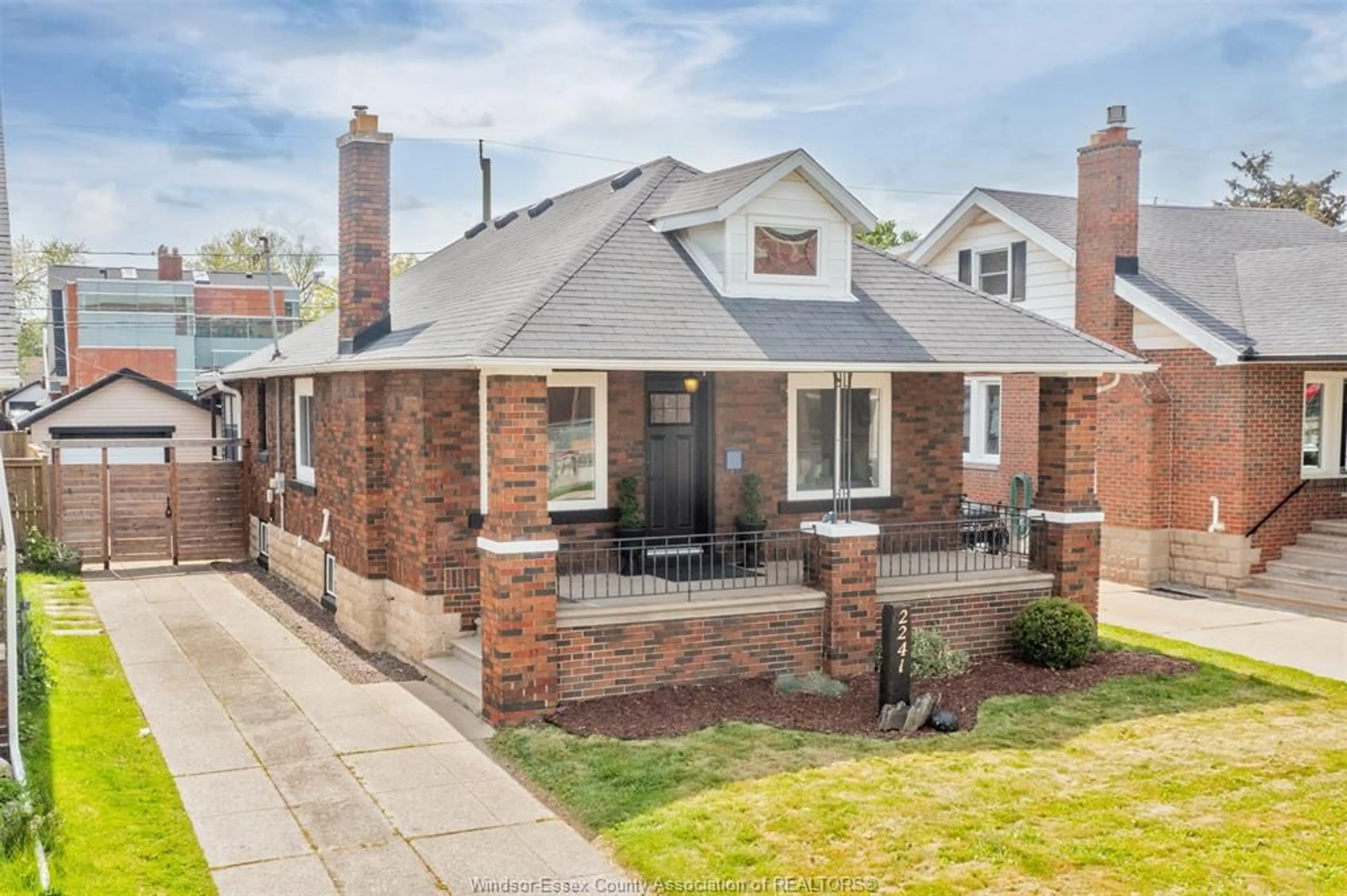 Home with brick exterior material, street for 2241 WINDERMERE Rd, Windsor Ontario N8W 2S7