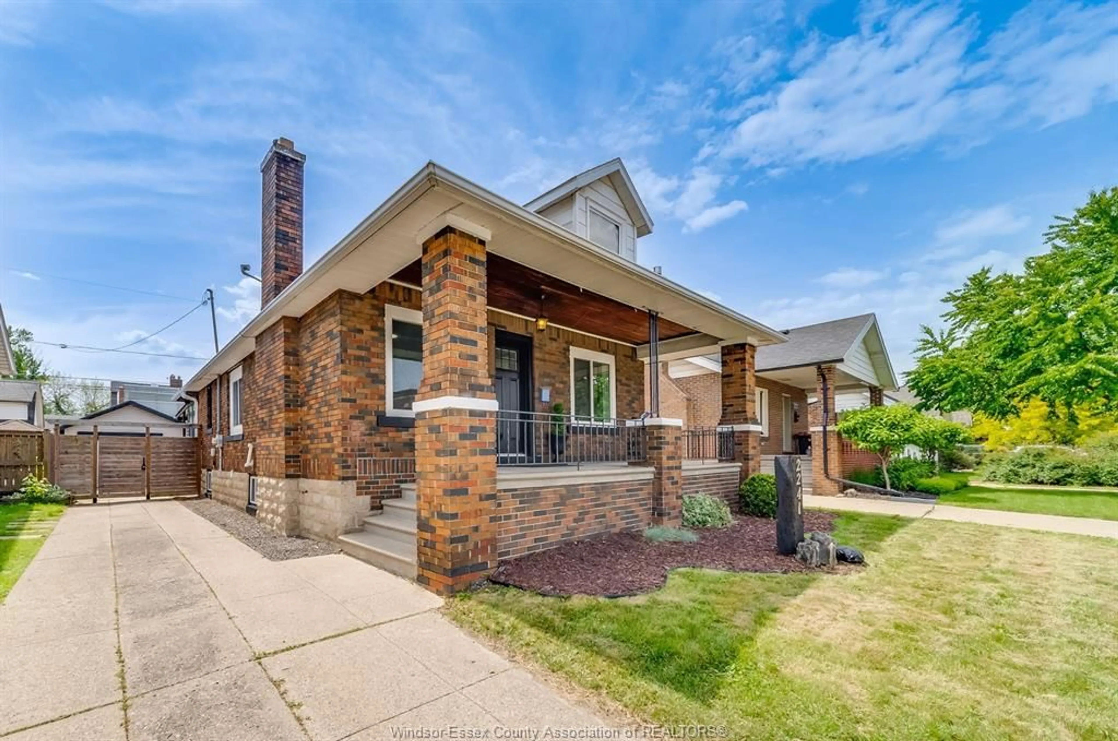 Home with brick exterior material, street for 2241 WINDERMERE Rd, Windsor Ontario N8W 2S7