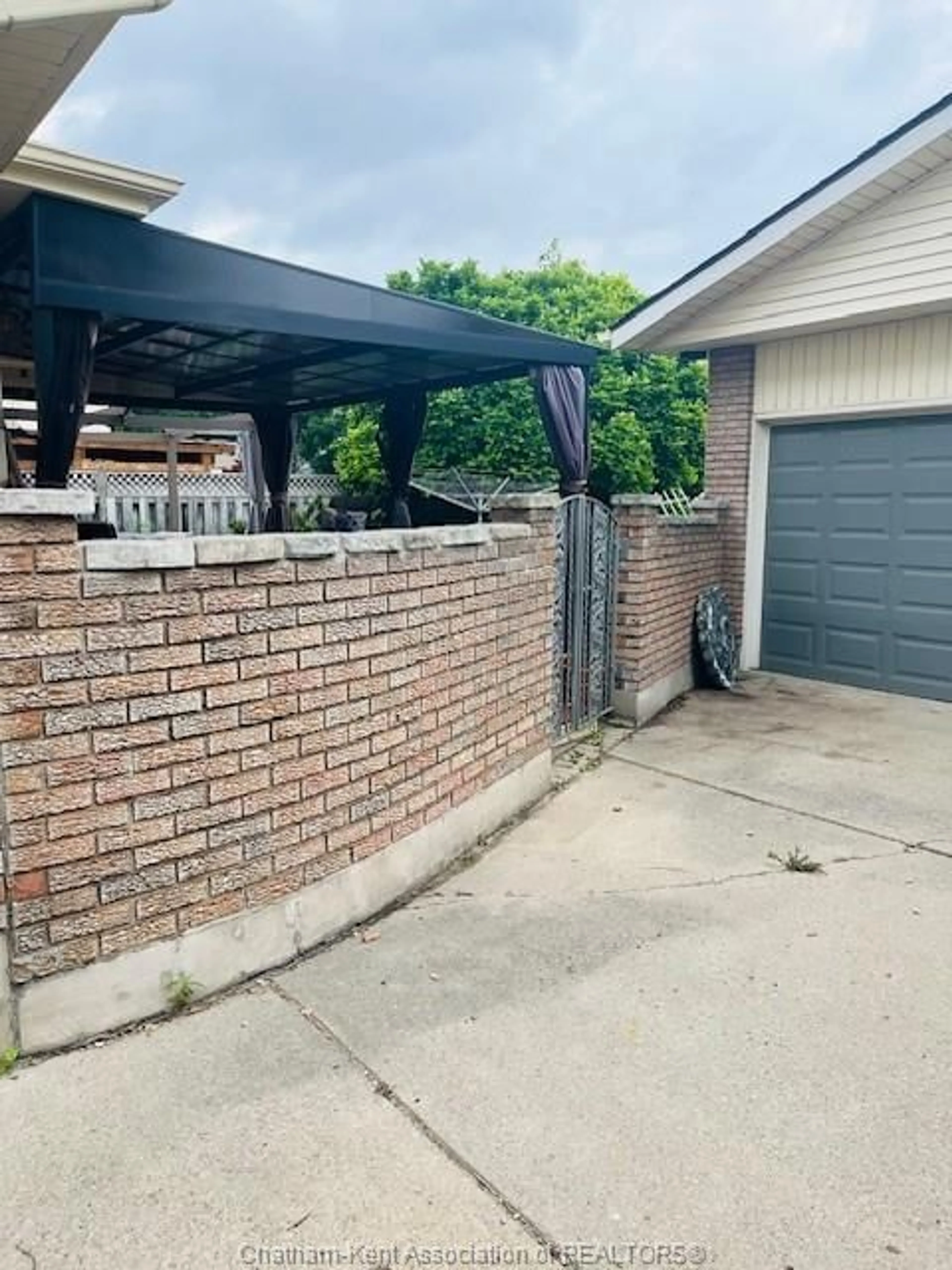 Home with brick exterior material, street for 147 St Michael Ave, Chatham Ontario N7M 6A8