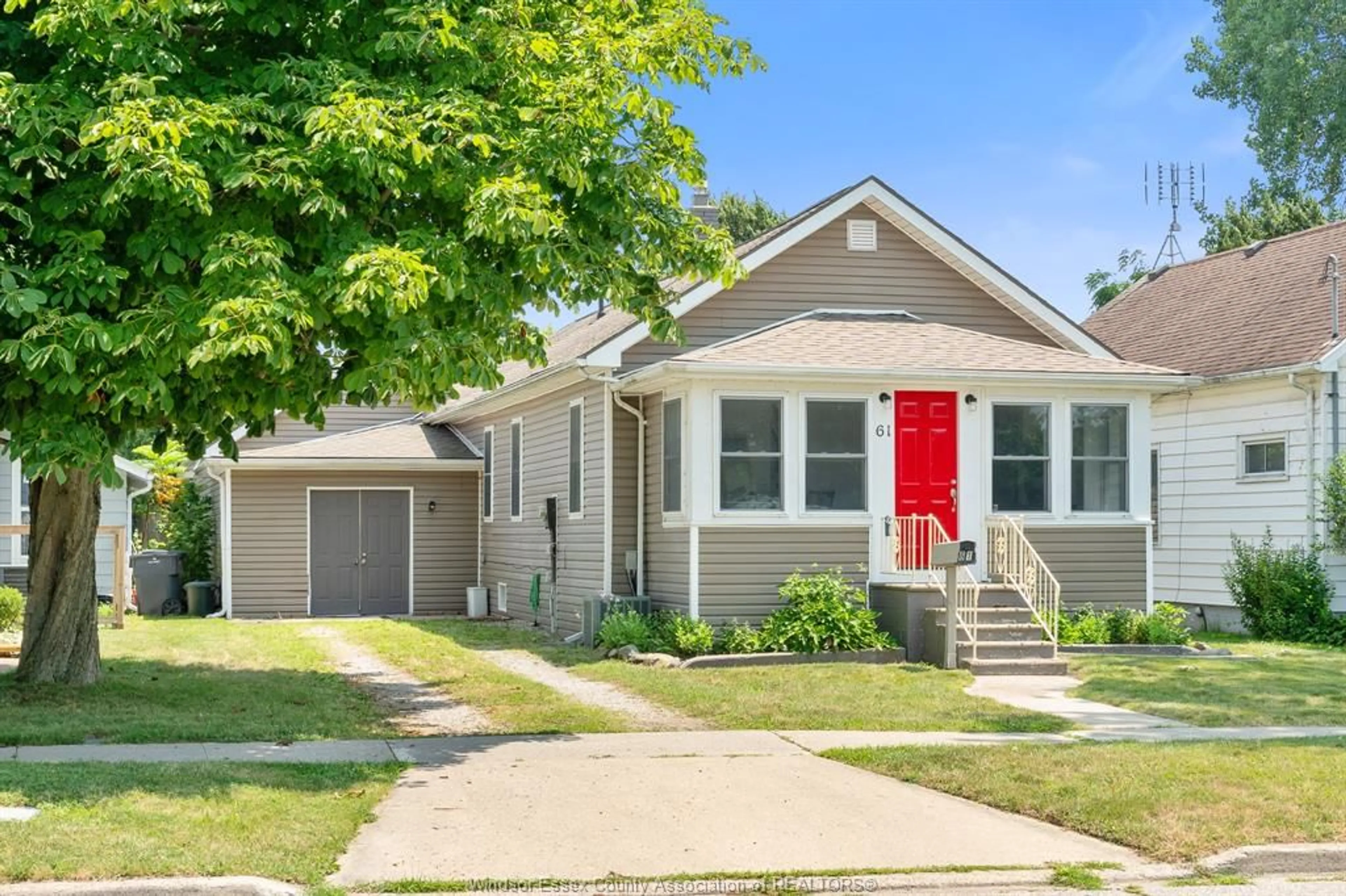 Home with vinyl exterior material, street for 61 Victoria Ave, Kingsville Ontario N9Y 1V9