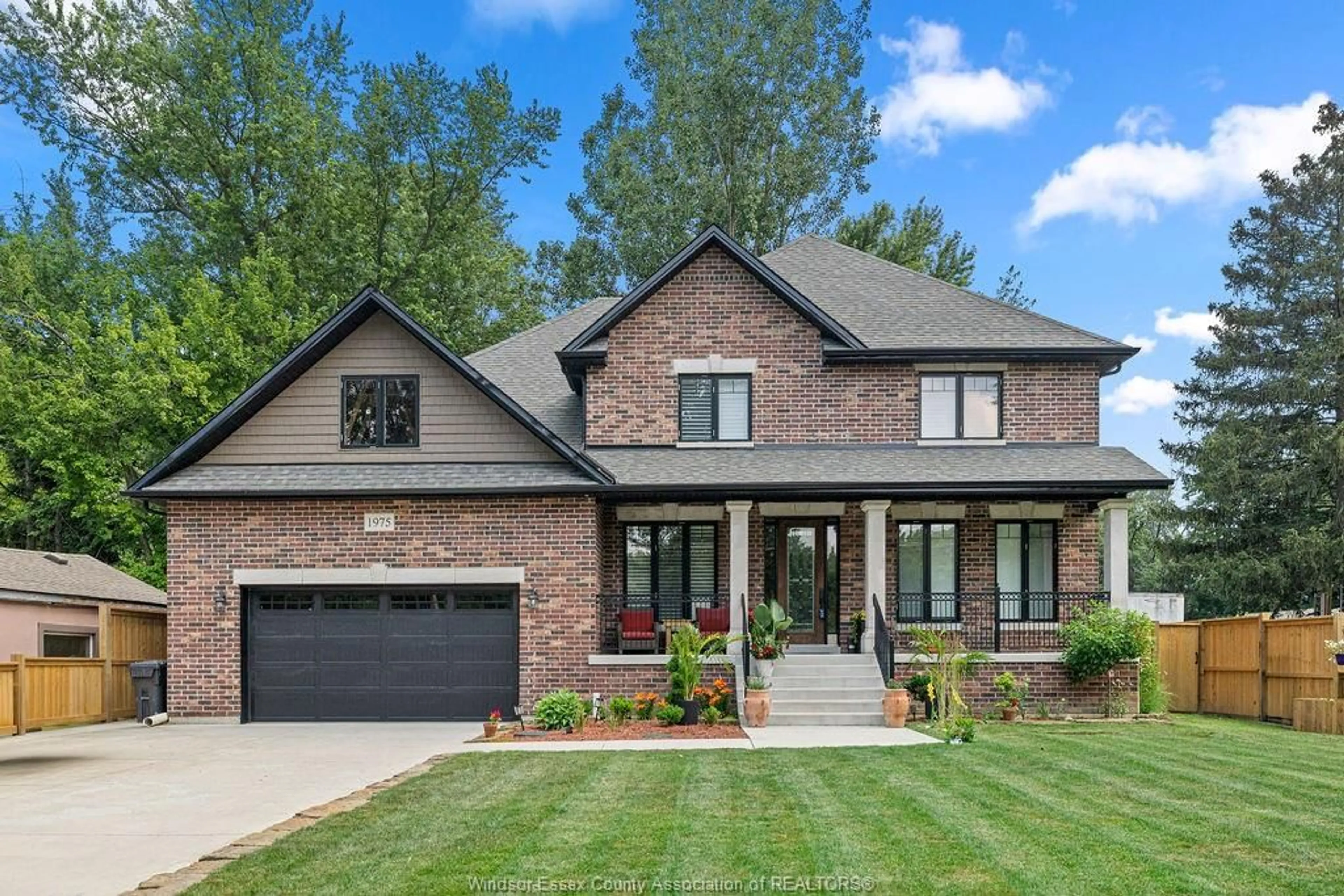 Home with brick exterior material, street for 1975 LANSING St, Windsor Ontario N9E 3S4