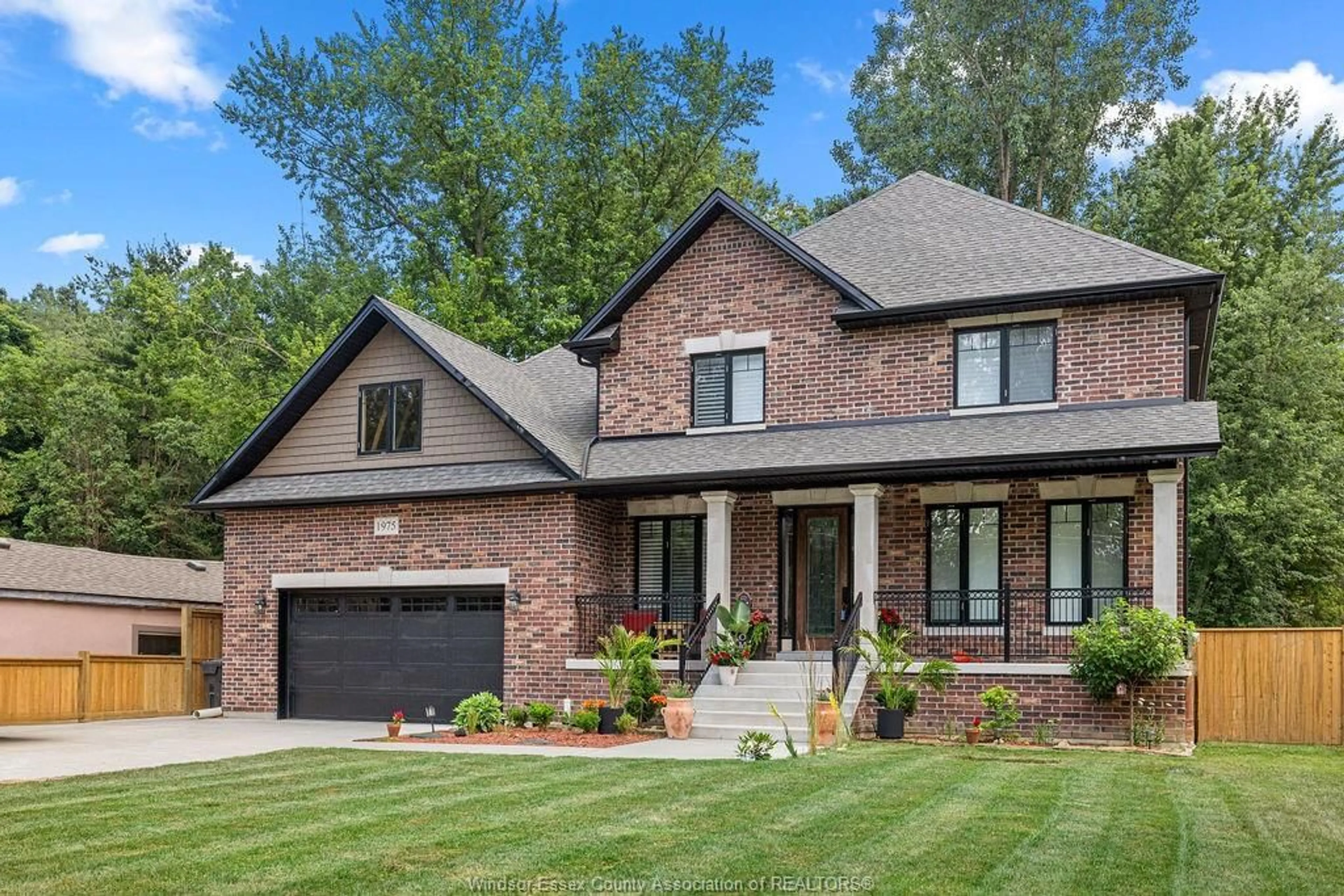 Home with brick exterior material, street for 1975 LANSING St, Windsor Ontario N9E 3S4
