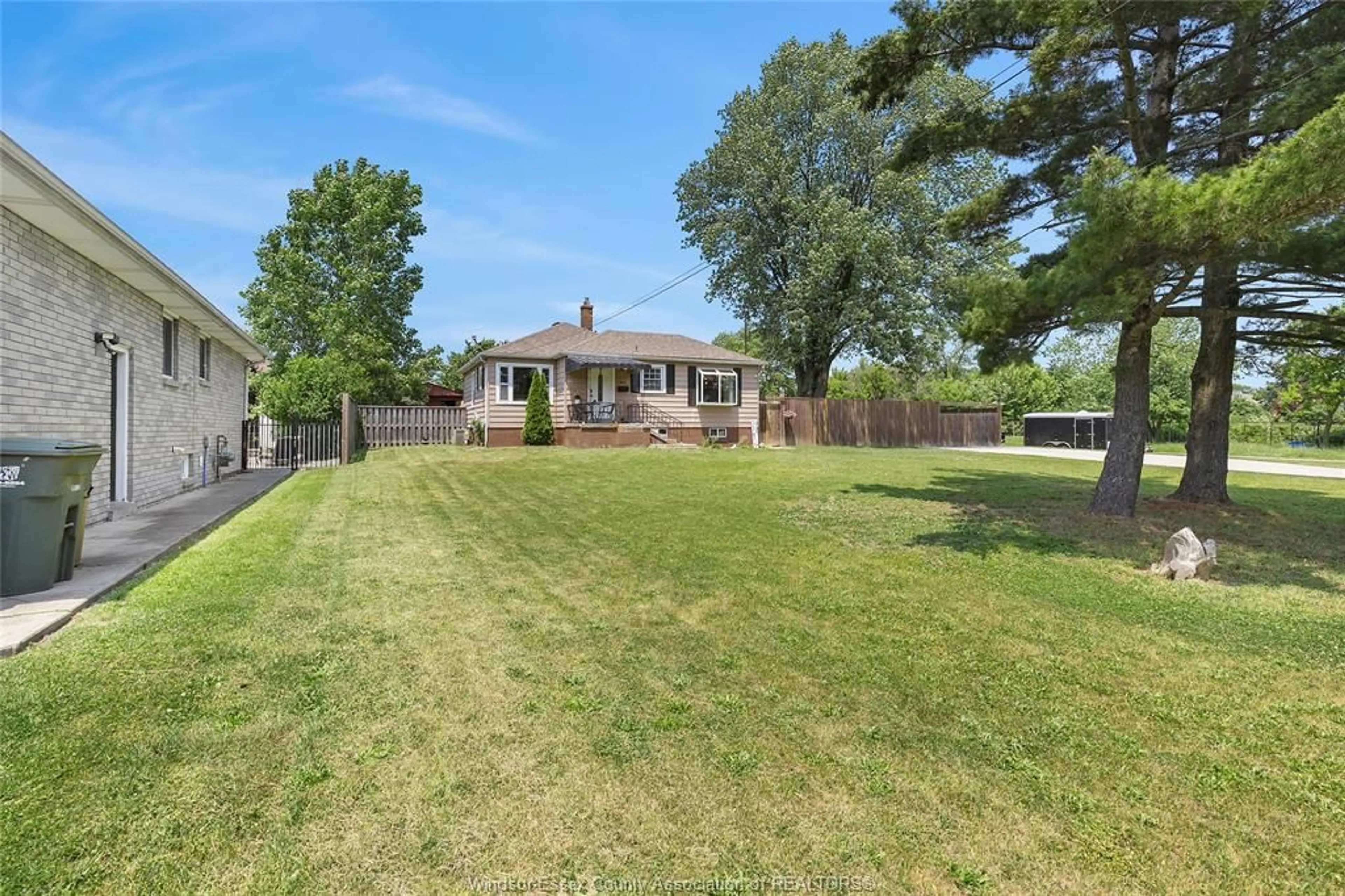 A pic from outside/outdoor area/front of a property/back of a property/a pic from drone, street for 1600 GRAND MARAIS Rd, Windsor Ontario N8W 1W2
