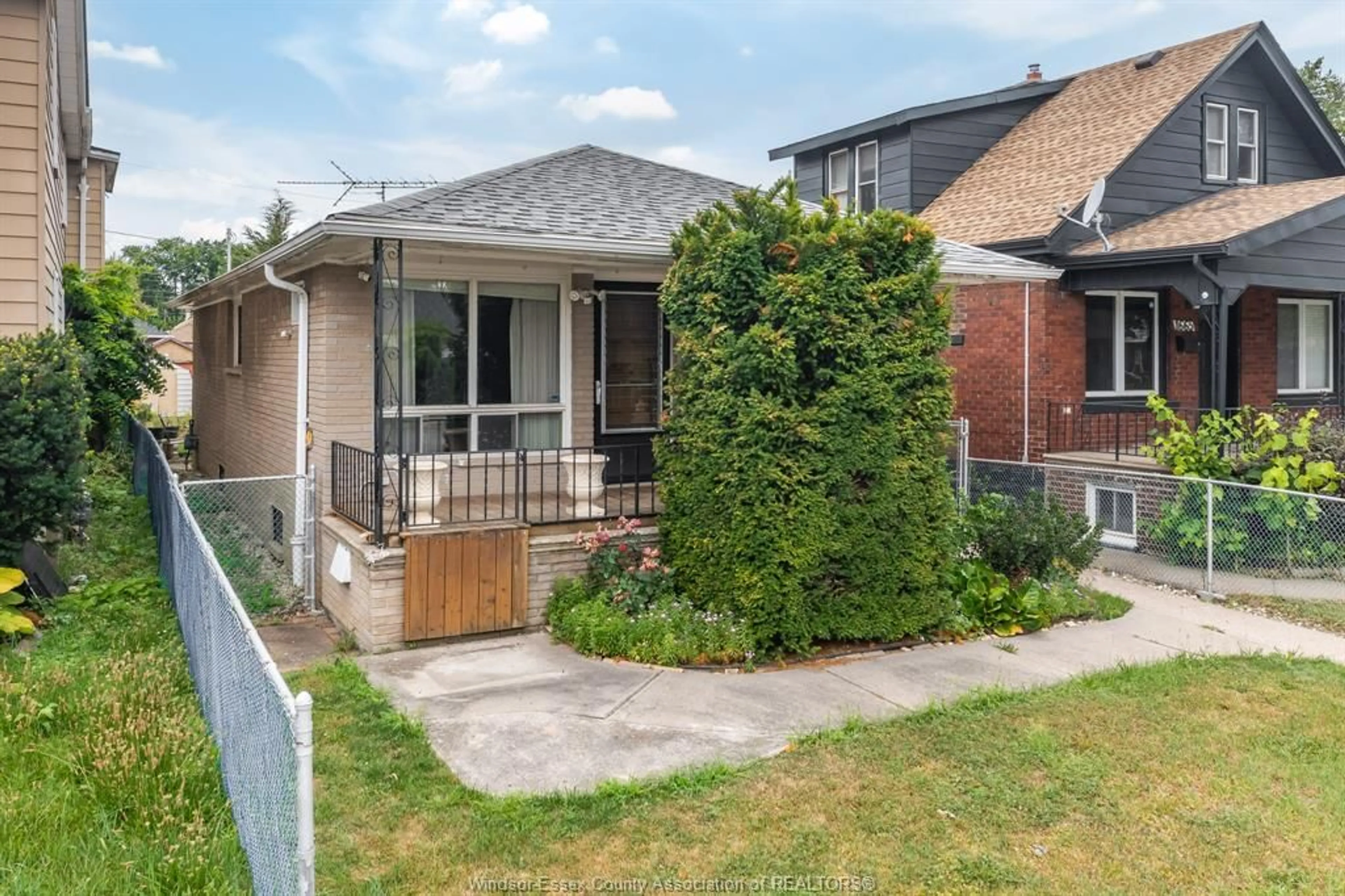 Home with brick exterior material, street for 1669 PARENT, Windsor Ontario N8X 4J9