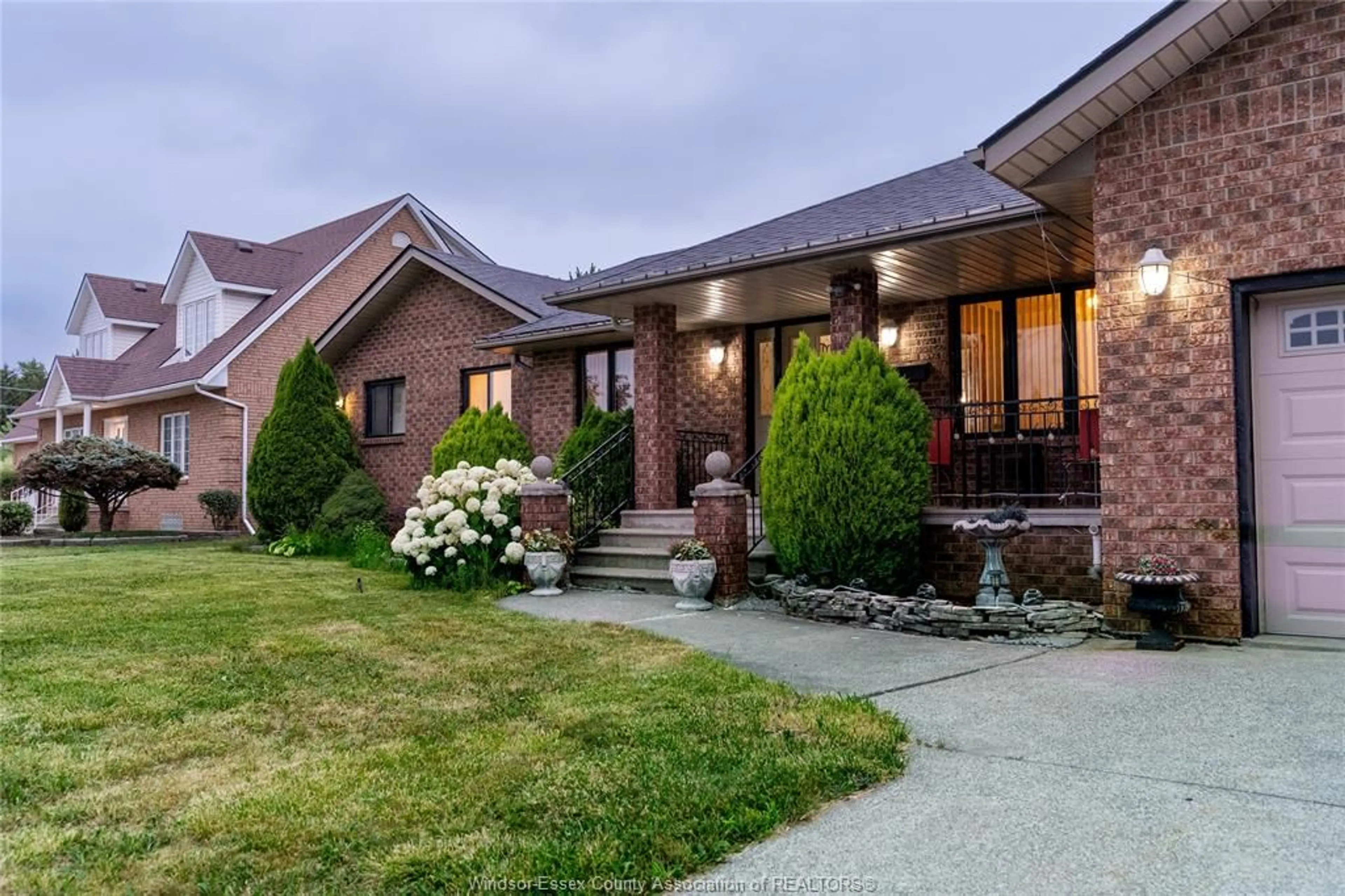 Home with brick exterior material, street for 12310 CANDLEWOOD, Tecumseh Ontario N9K 1B5