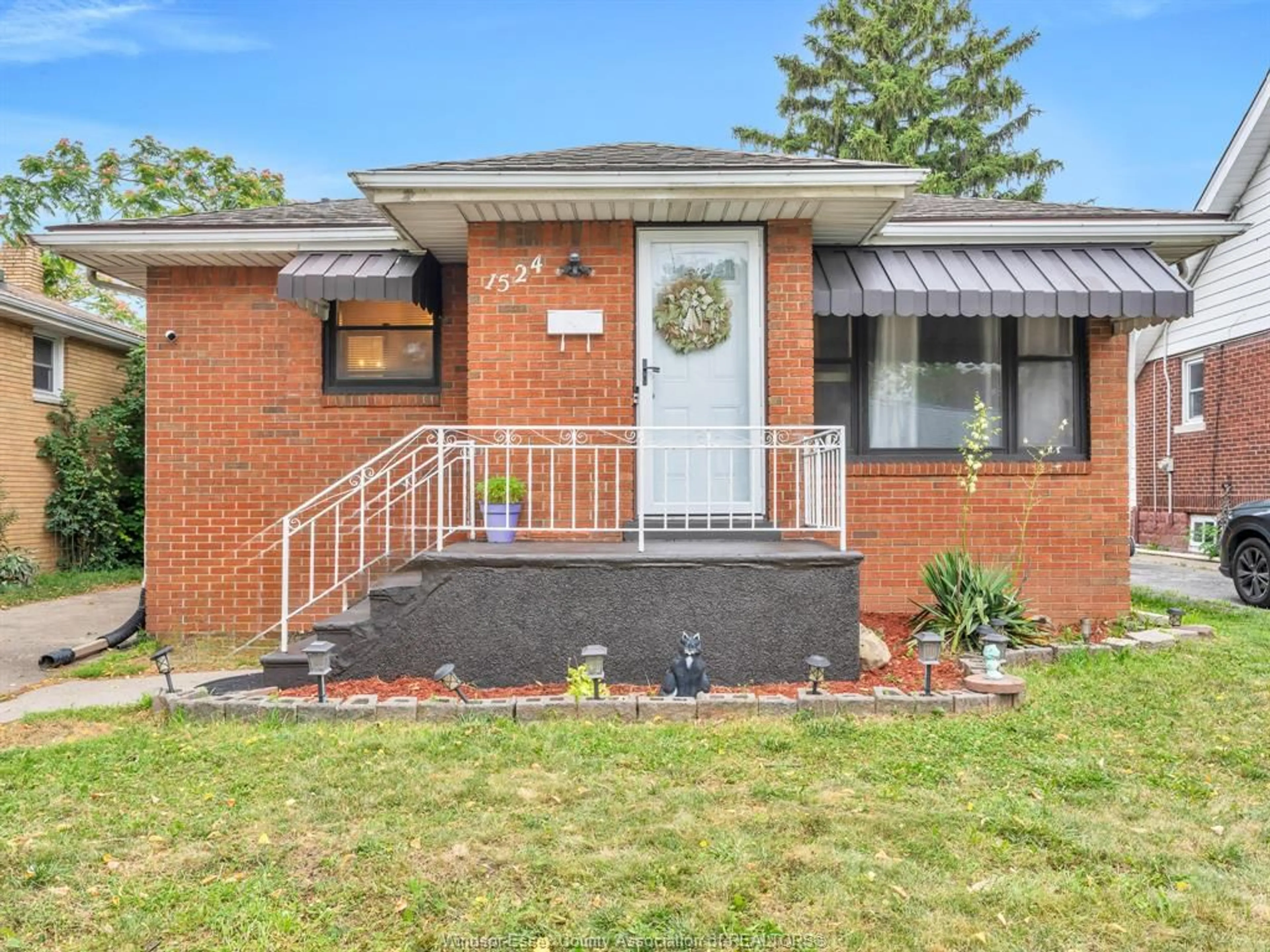 Home with brick exterior material, street for 1524 PILLETTE Rd, Windsor Ontario N8Y 3C2