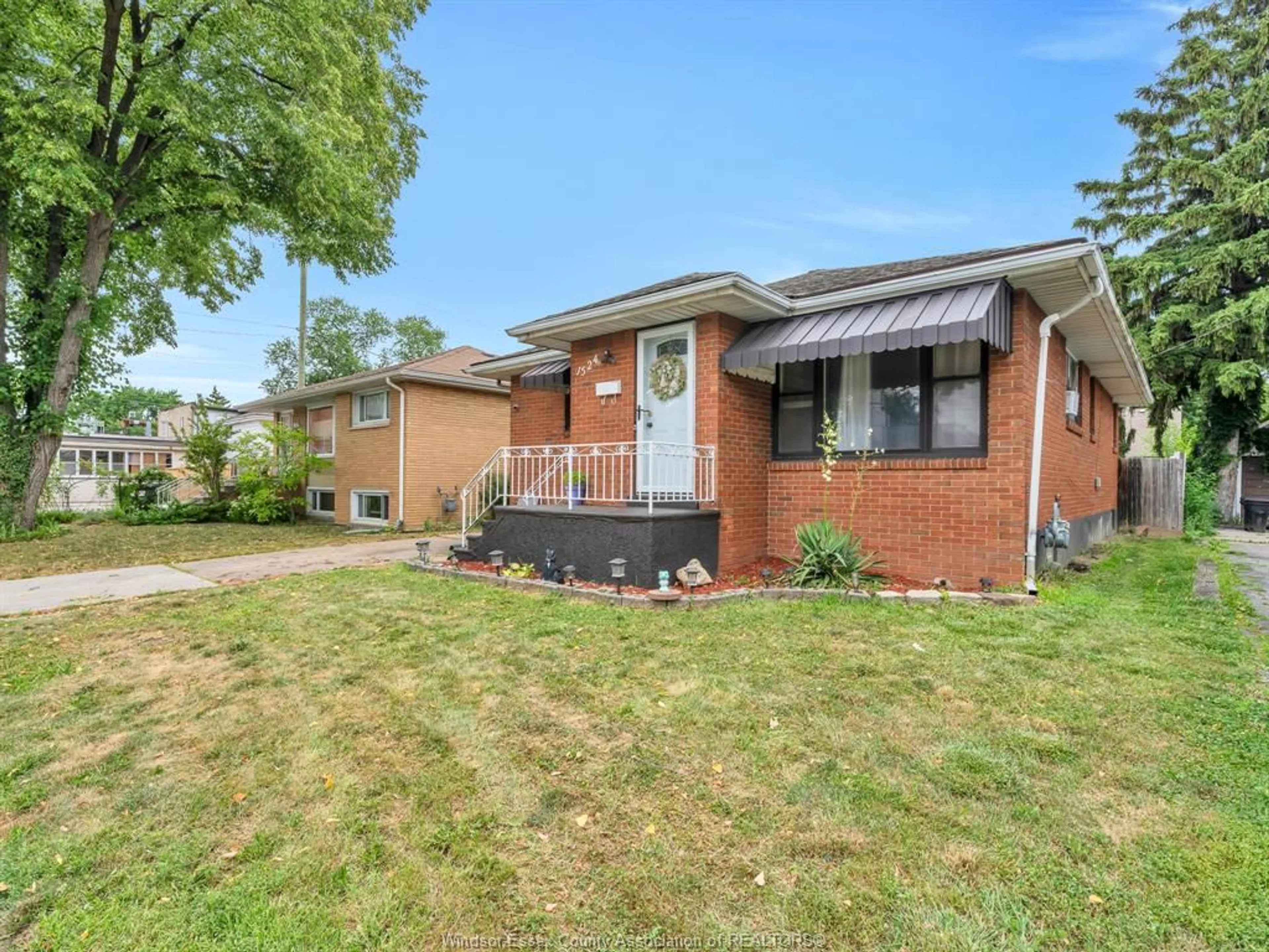 Home with brick exterior material, street for 1524 PILLETTE Rd, Windsor Ontario N8Y 3C2