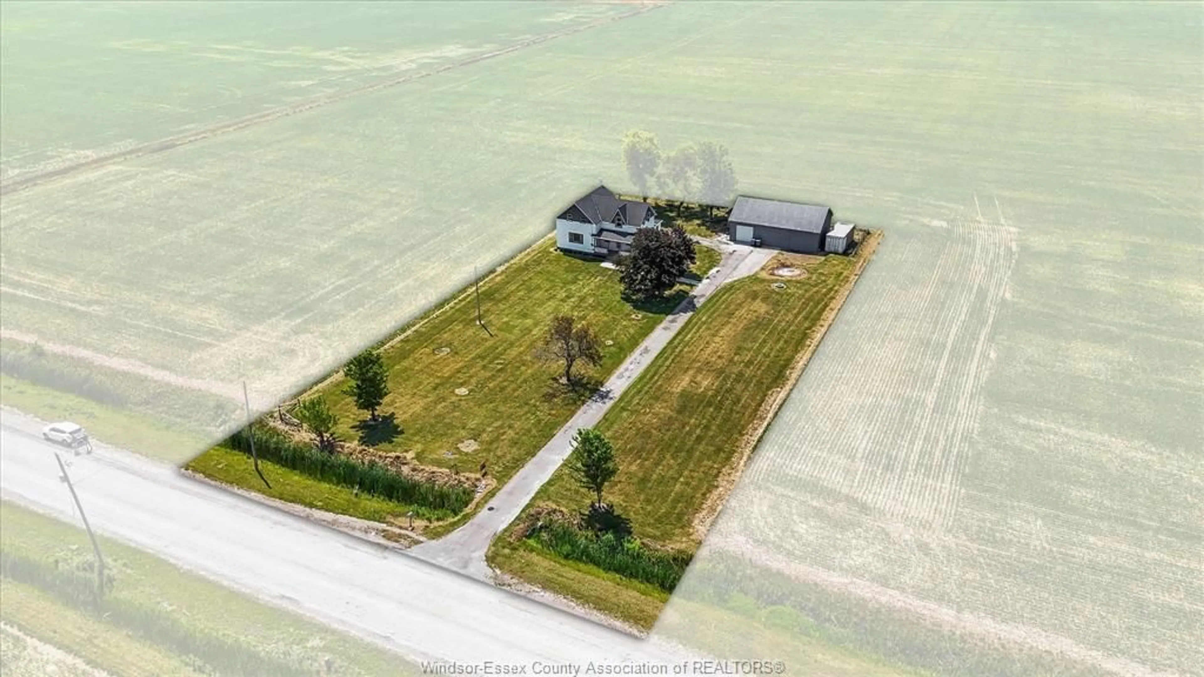A pic from outside/outdoor area/front of a property/back of a property/a pic from drone, water/lake/river/ocean view for 5845 LAKESHORE ROAD 305, Comber Ontario N0P 1J0