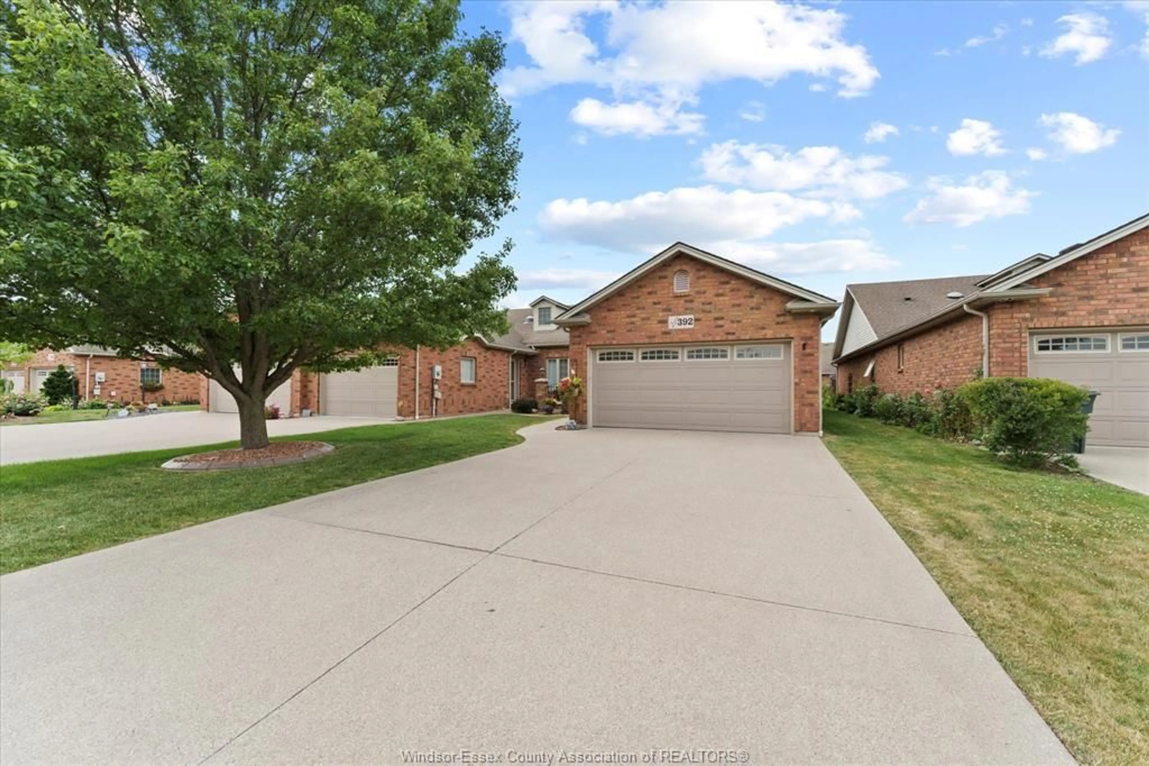 A pic from outside/outdoor area/front of a property/back of a property/a pic from drone, street for 392 Lenore Street, Belle River Ontario N8L 0P3