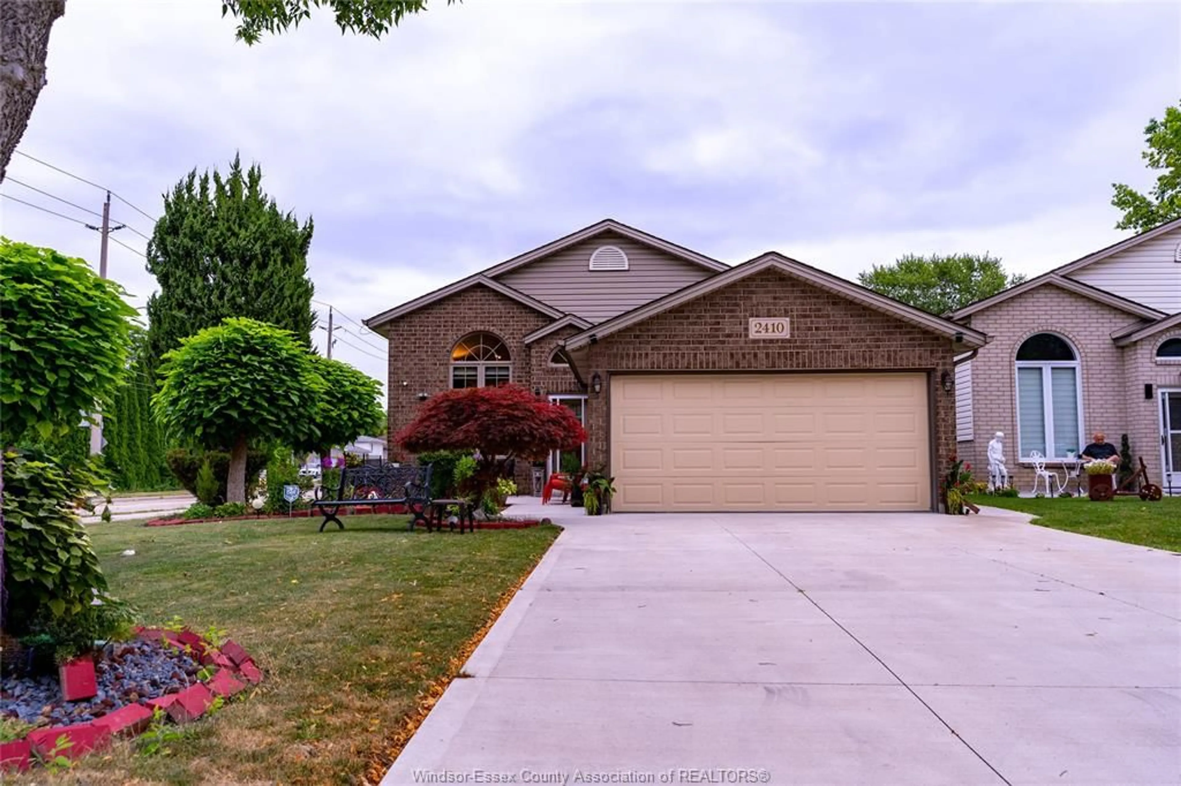 Home with brick exterior material, street for 2410 ST. CLAIR, Windsor Ontario N9E 4T6