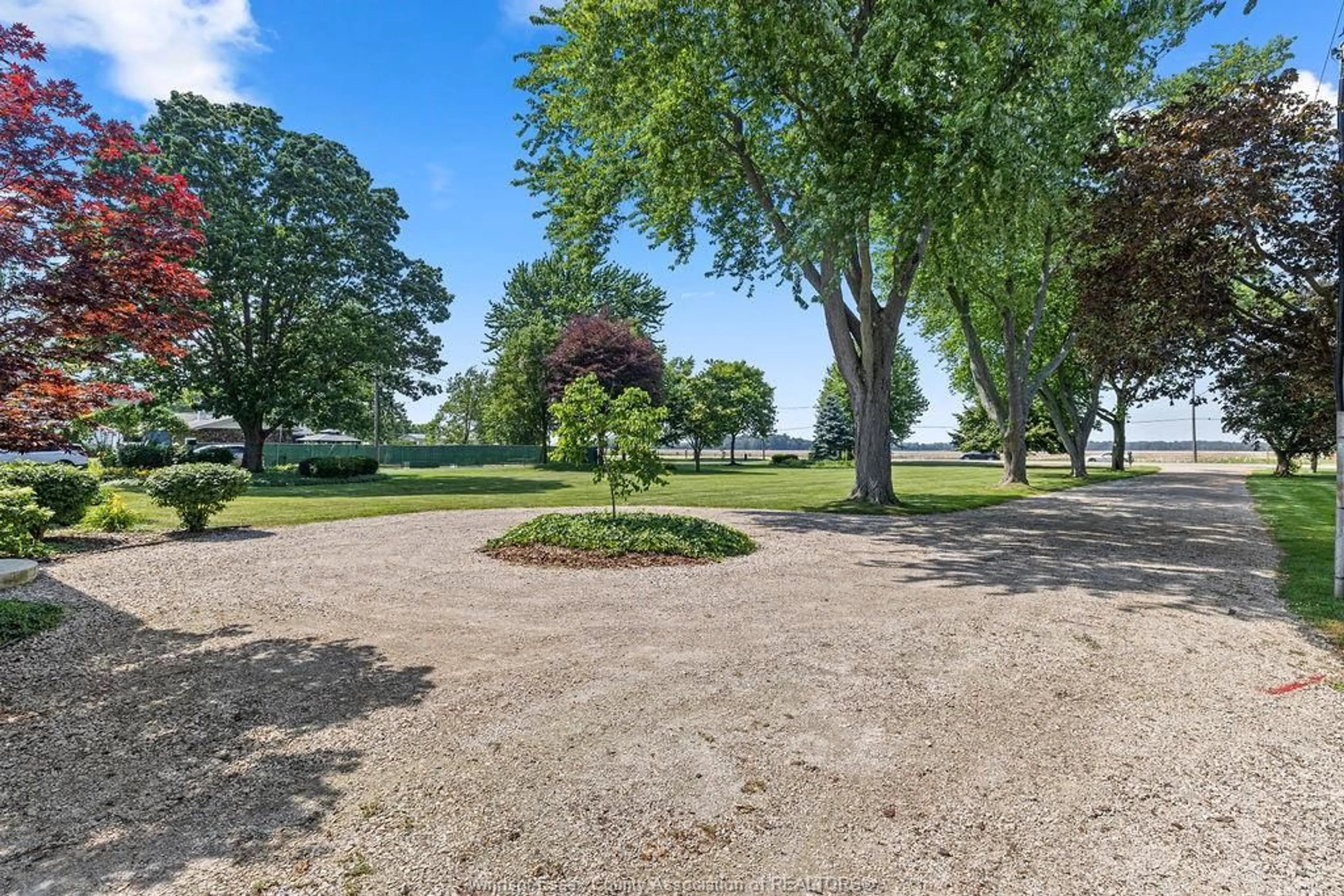 A pic from outside/outdoor area/front of a property/back of a property/a pic from drone, water/lake/river/ocean view for 1695 HERITAGE, Kingsville Ontario N9Y 2E6
