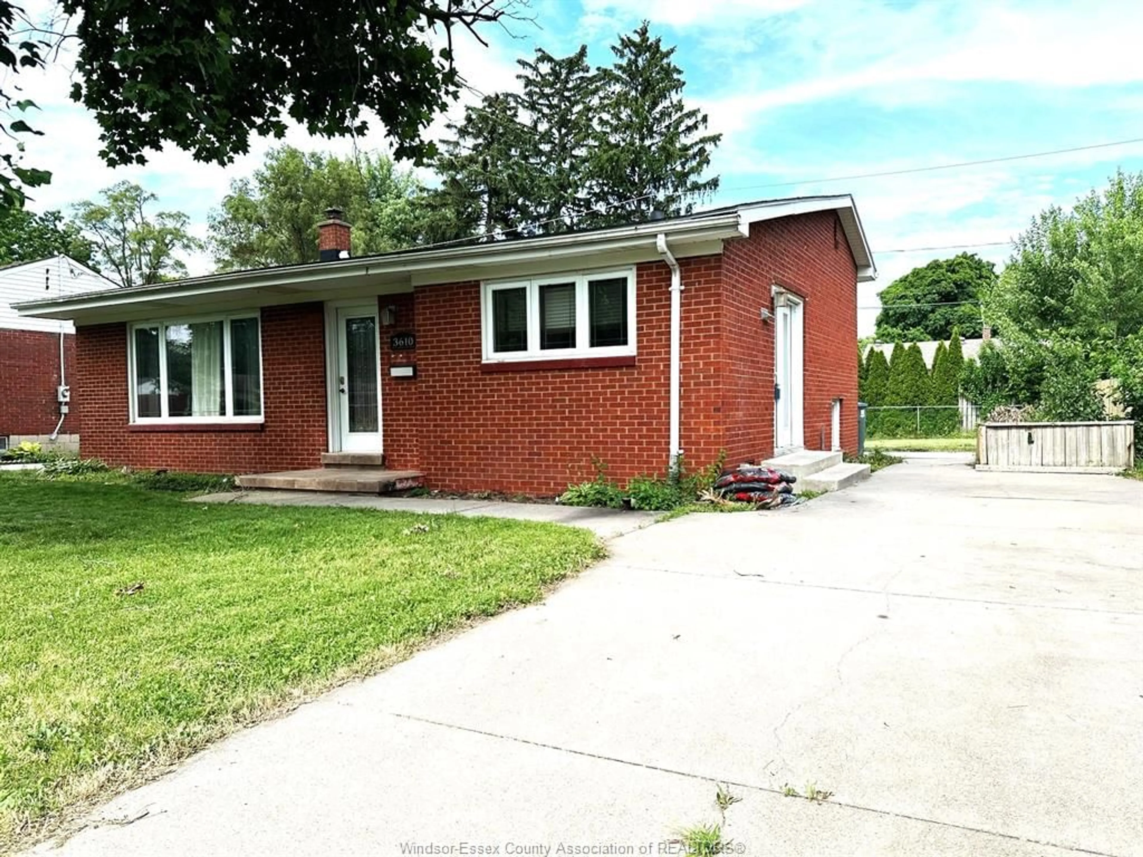 Home with brick exterior material, street for 3610 Woodland, Windsor Ontario N9E 1Z8