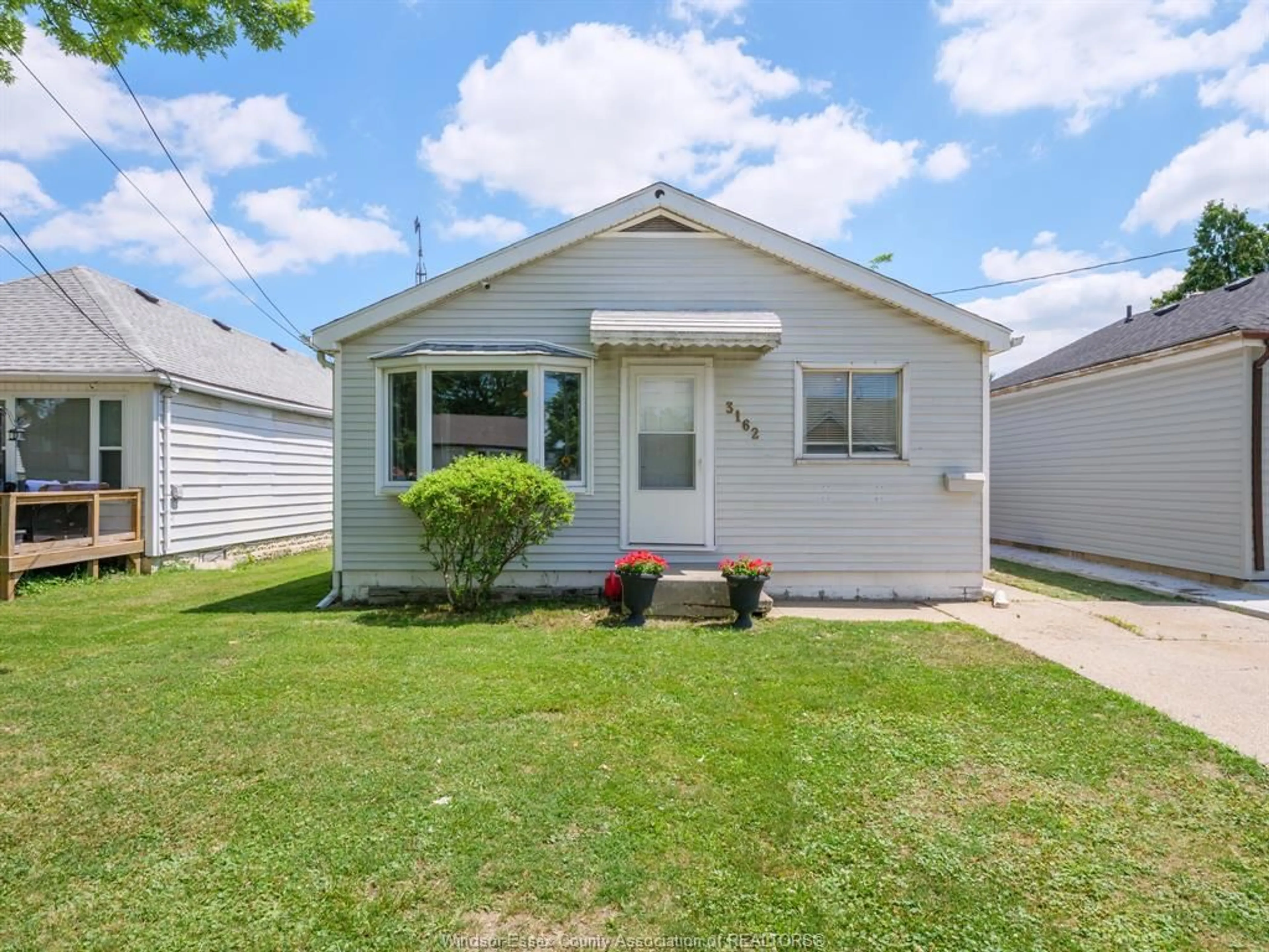 Home with vinyl exterior material, street for 3162 Riberdy Rd, Windsor Ontario N8W 3T8