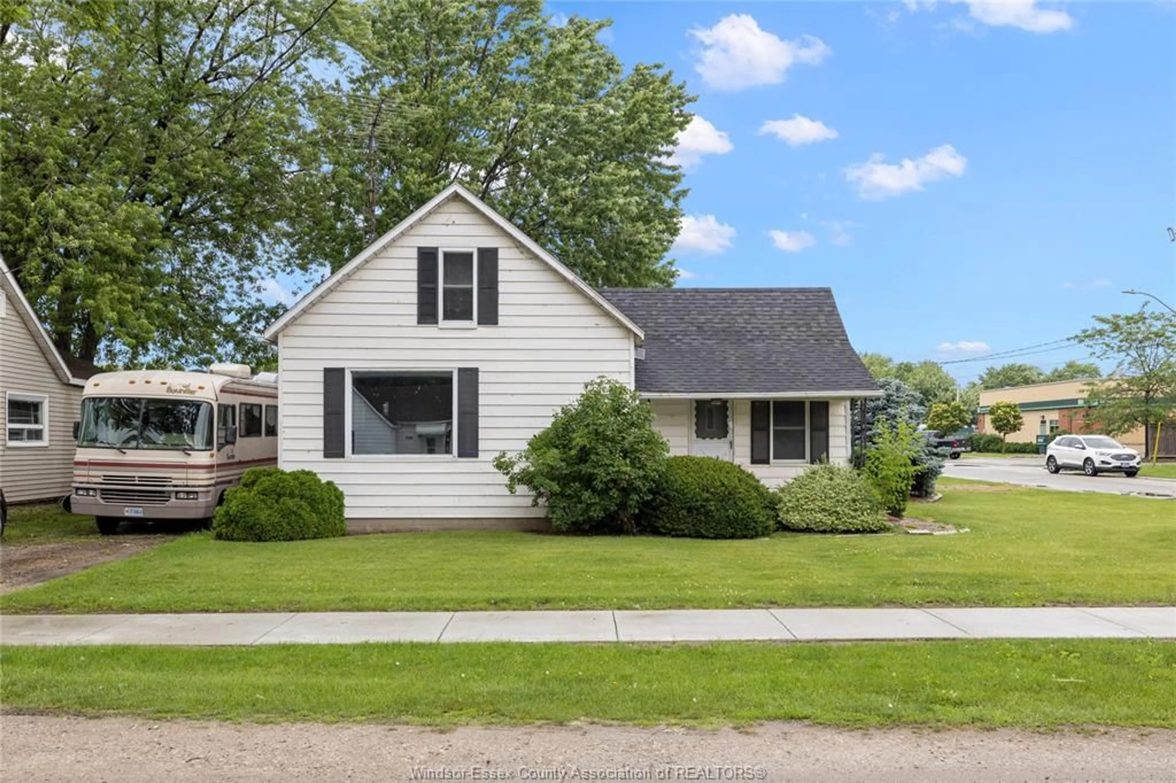 Home with vinyl exterior material, street for 389 St. Charles St, Belle River Ontario N0R 1A0