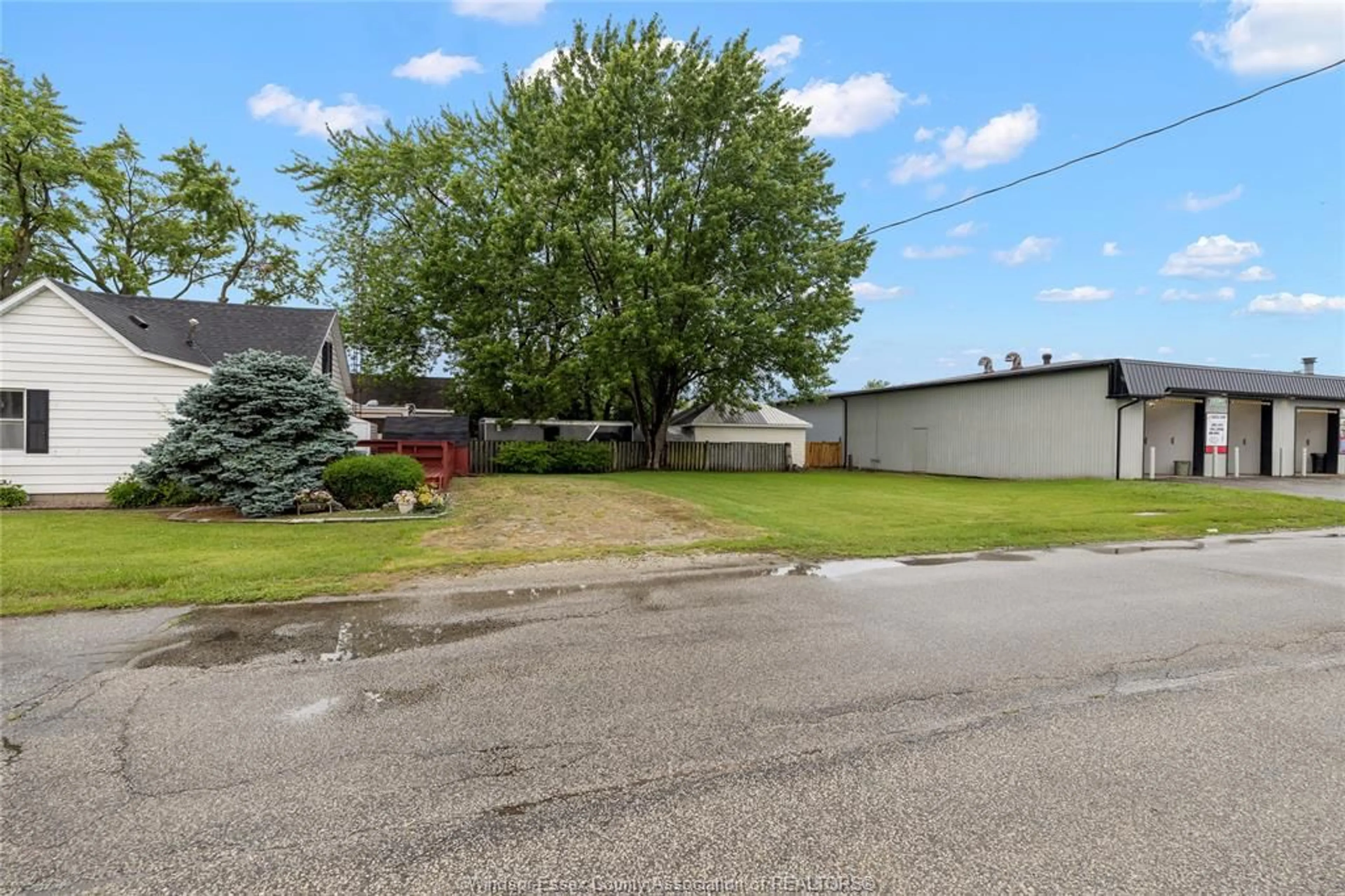 A pic from outside/outdoor area/front of a property/back of a property/a pic from drone, street for 389 St. Charles St, Belle River Ontario N0R 1A0