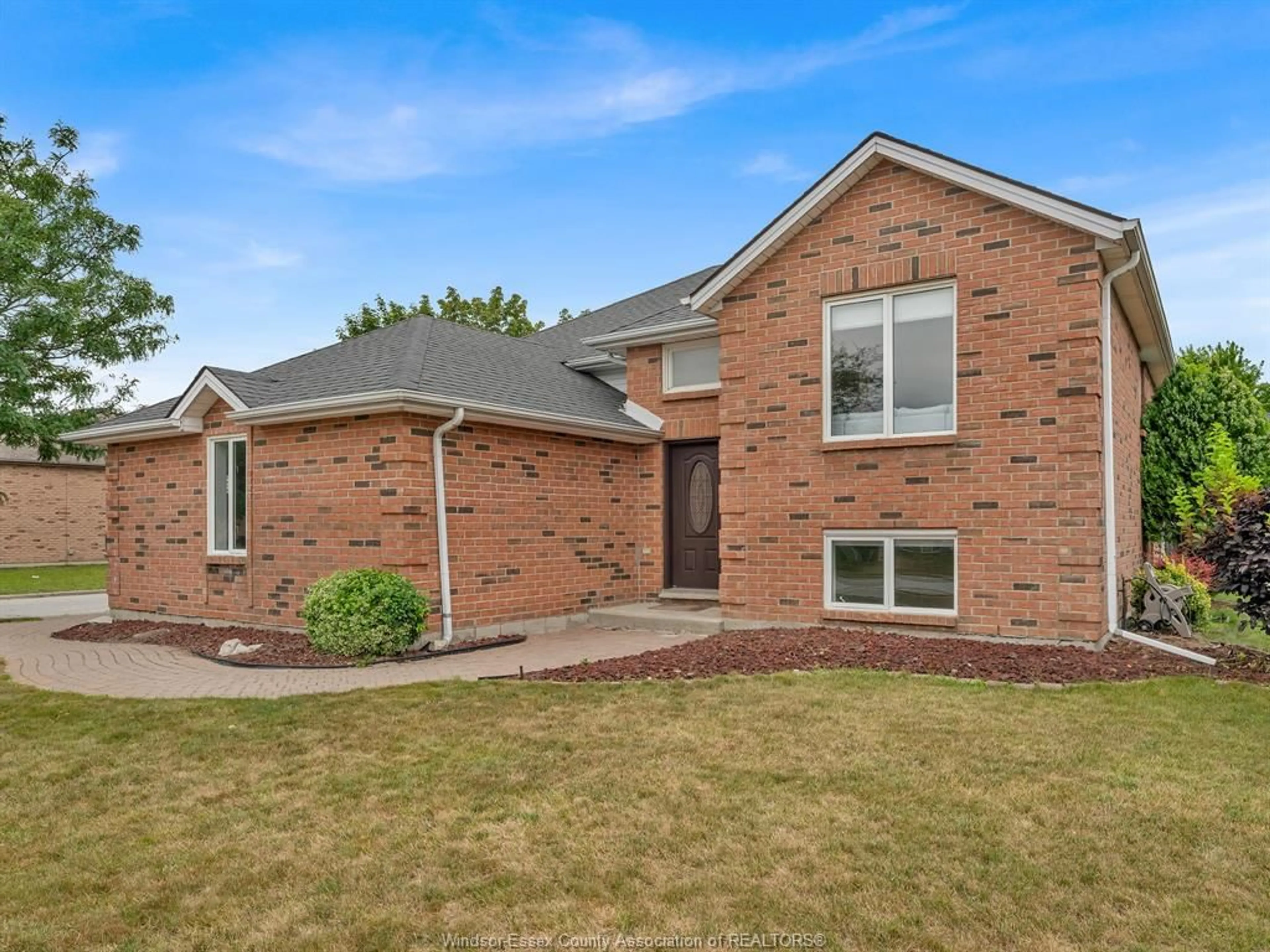 Home with brick exterior material, street for 882 MARCUZ Crt, Windsor Ontario N9G 2T3