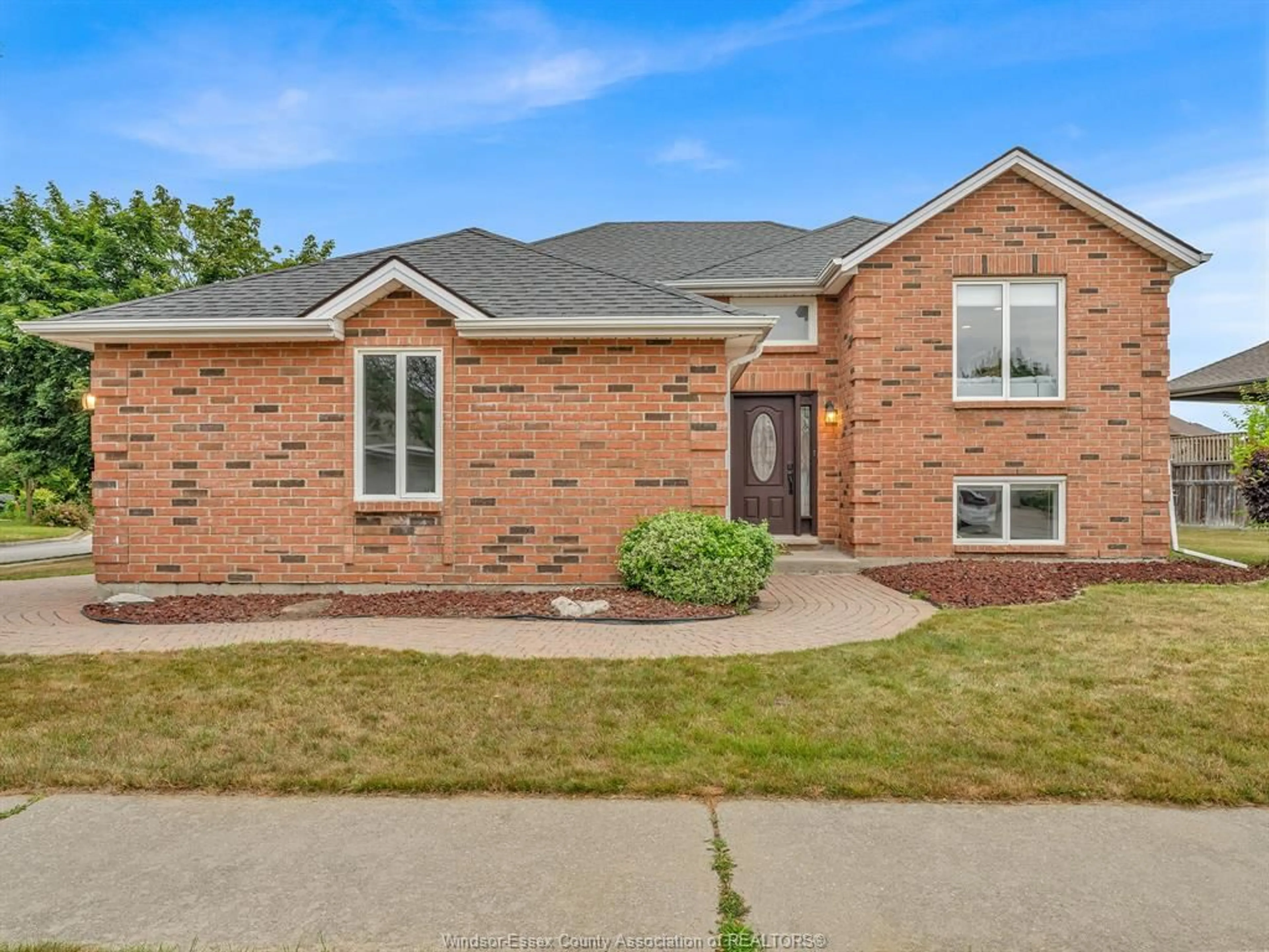 Home with brick exterior material, street for 882 MARCUZ Crt, Windsor Ontario N9G 2T3
