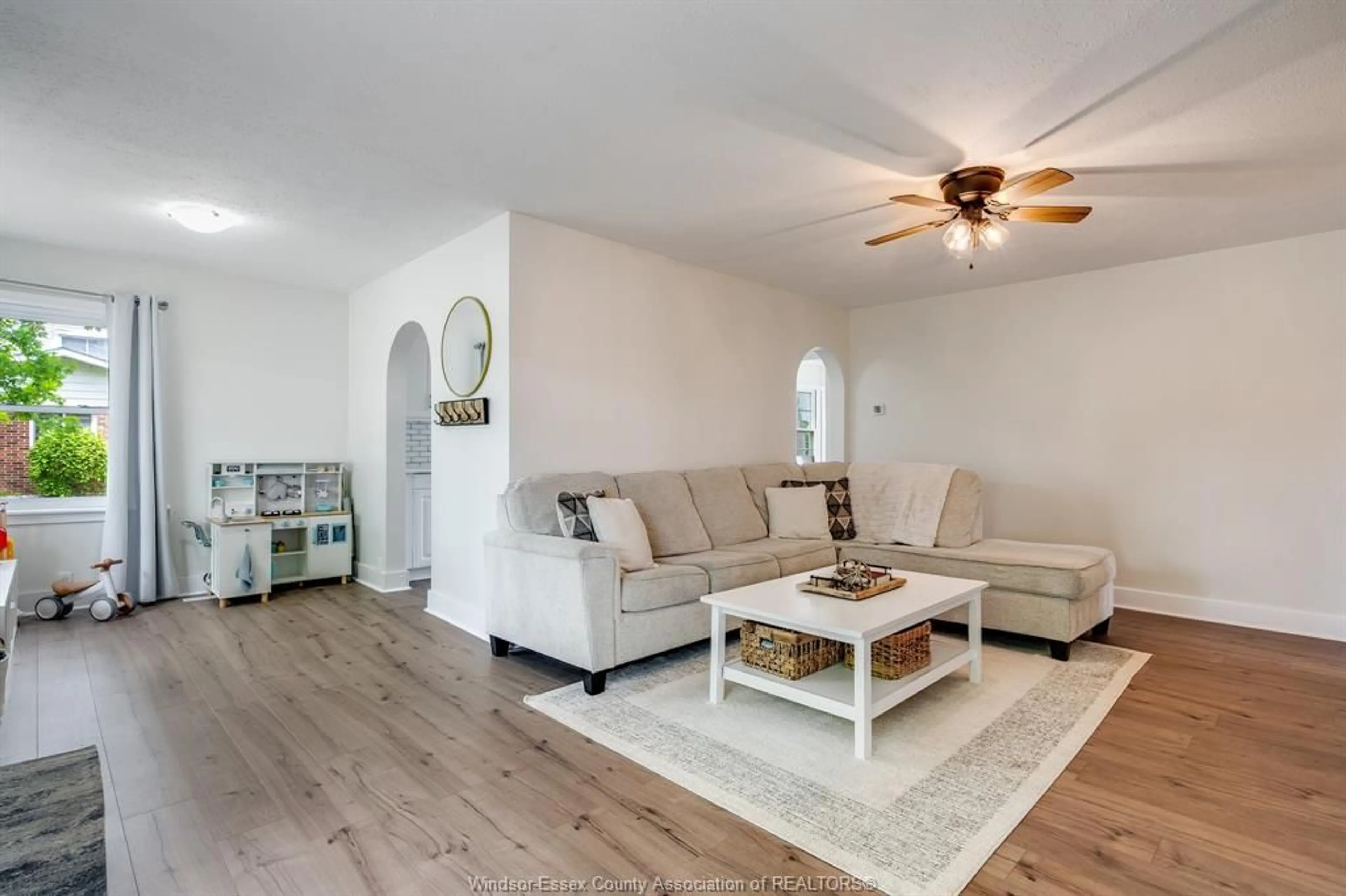 Living room with furniture, wood/laminate floor for 5 NOBLE Ave, Leamington Ontario N8H 3S5